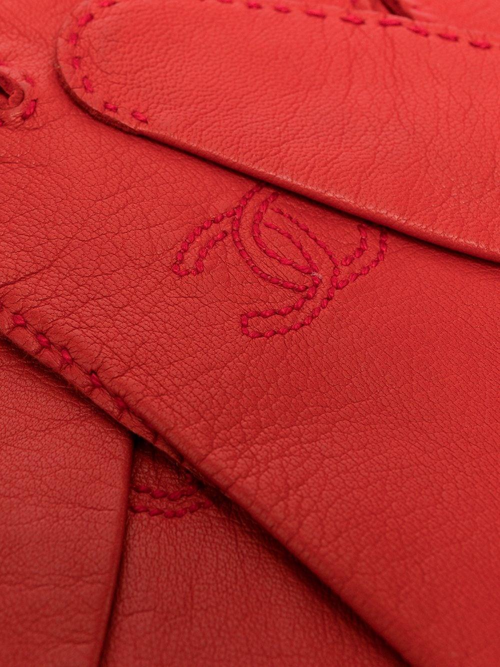 Red Chanel CC leather gloves