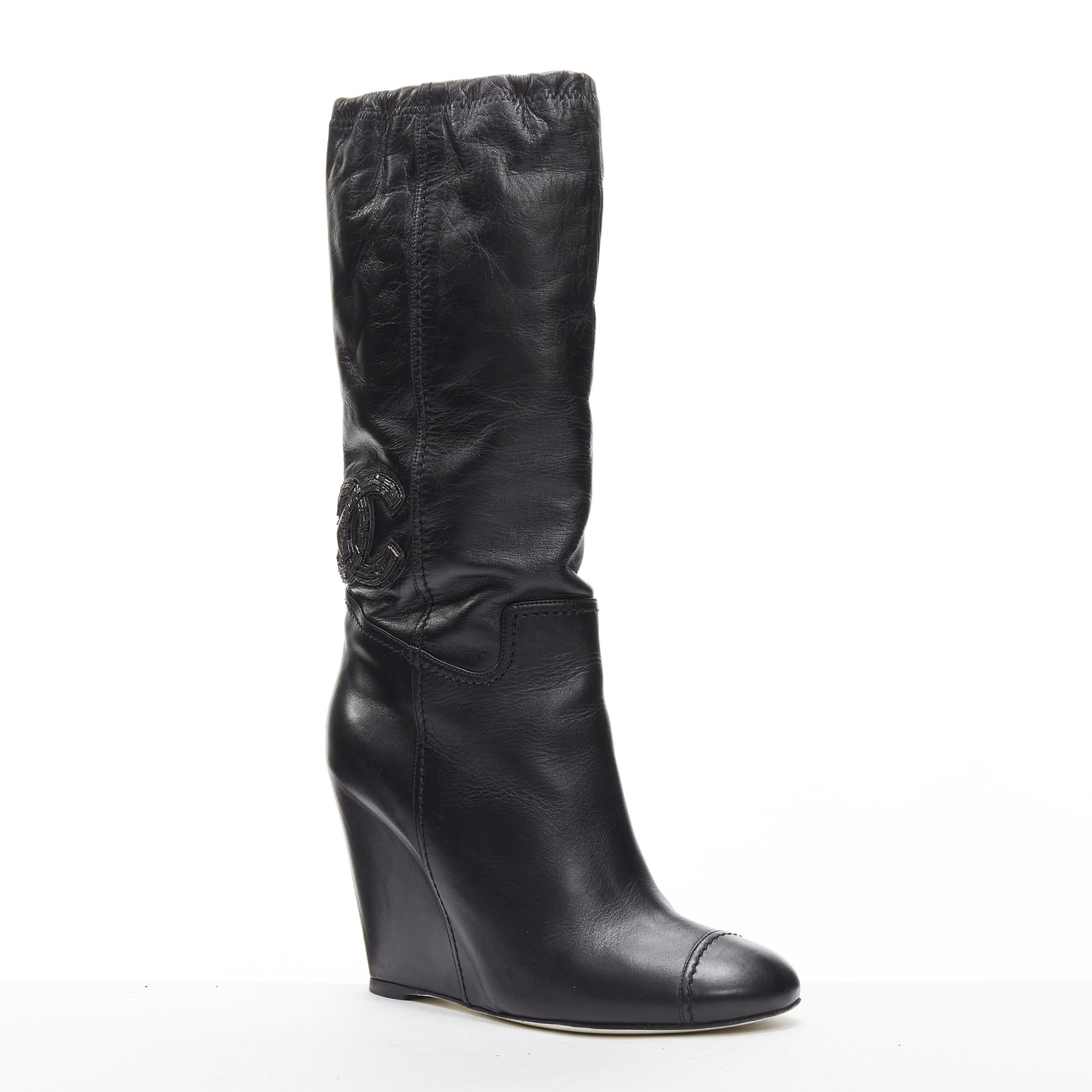 Black CHANEL CC logo bead embellishment black leather wedge heeled boots EU38 For Sale