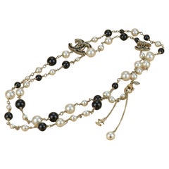 Chanel CC Logo Black Enamel Long Pearl Necklace in Gilt Gold