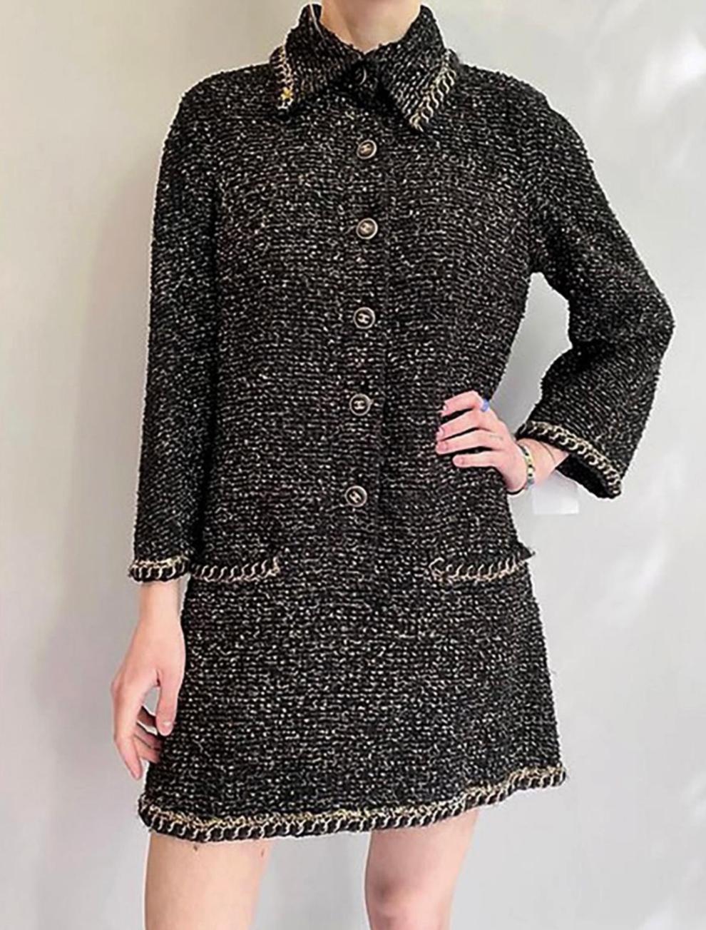Chanel anthracite fantasy tweed dress with metallic chain embellishment. CC logo buttons at front, fully lined with silk. 
Size mark 34 FR / Condition is pristine