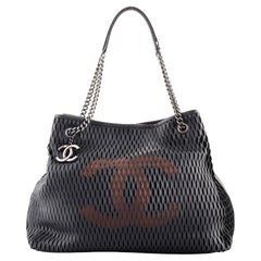 Chanel Perforated Tote - 10 For Sale on 1stDibs  perforated chanel bag, perforated  tote bag, chanel preforated leather black logo bag