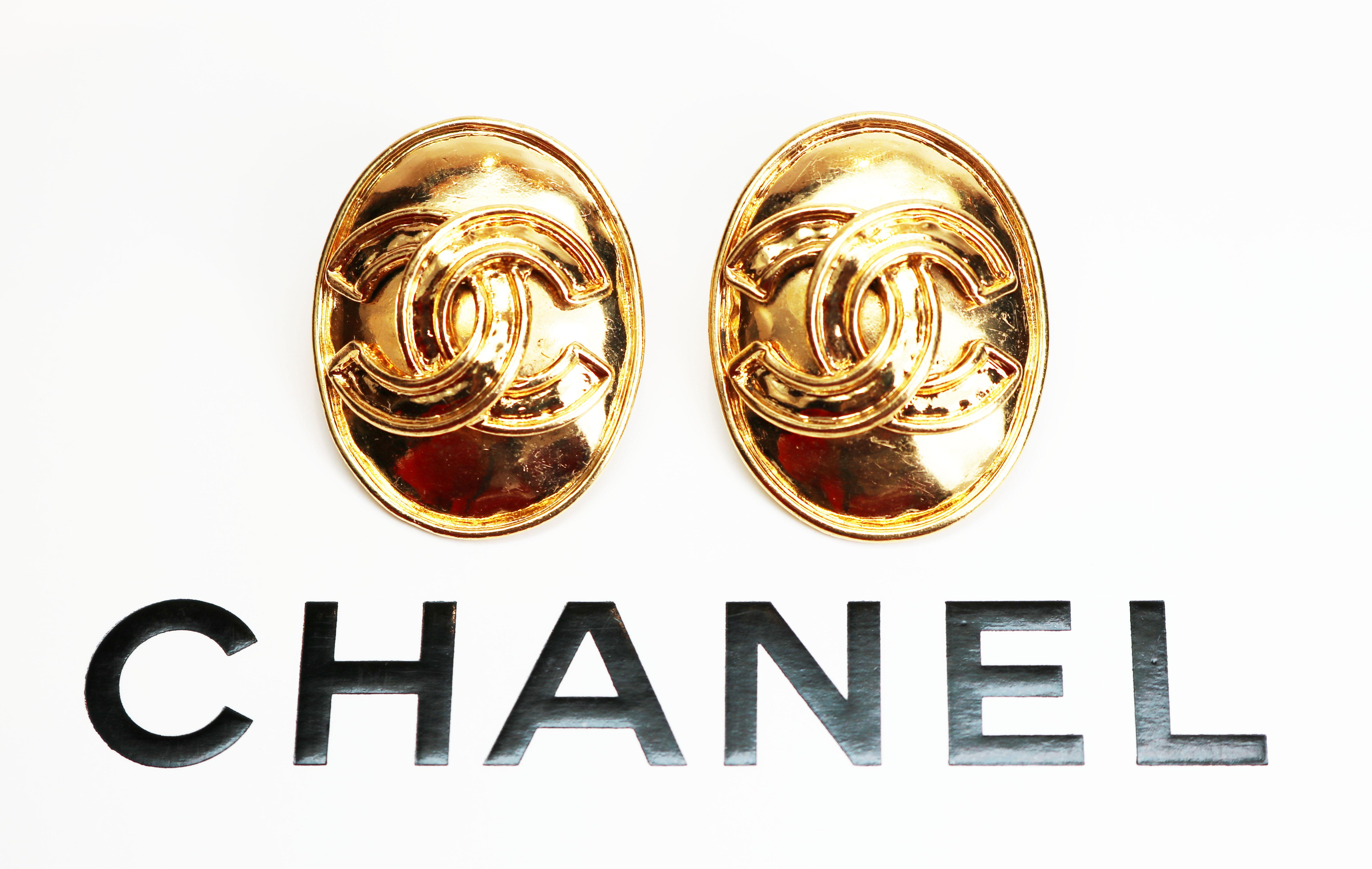 VINTAGE CHANEL Earrings *signed* Genuine Gold Oval Chanel CC Logo Medallion Clip-on French Designer Statement Earrings
These exceptional earrings measure 1.25