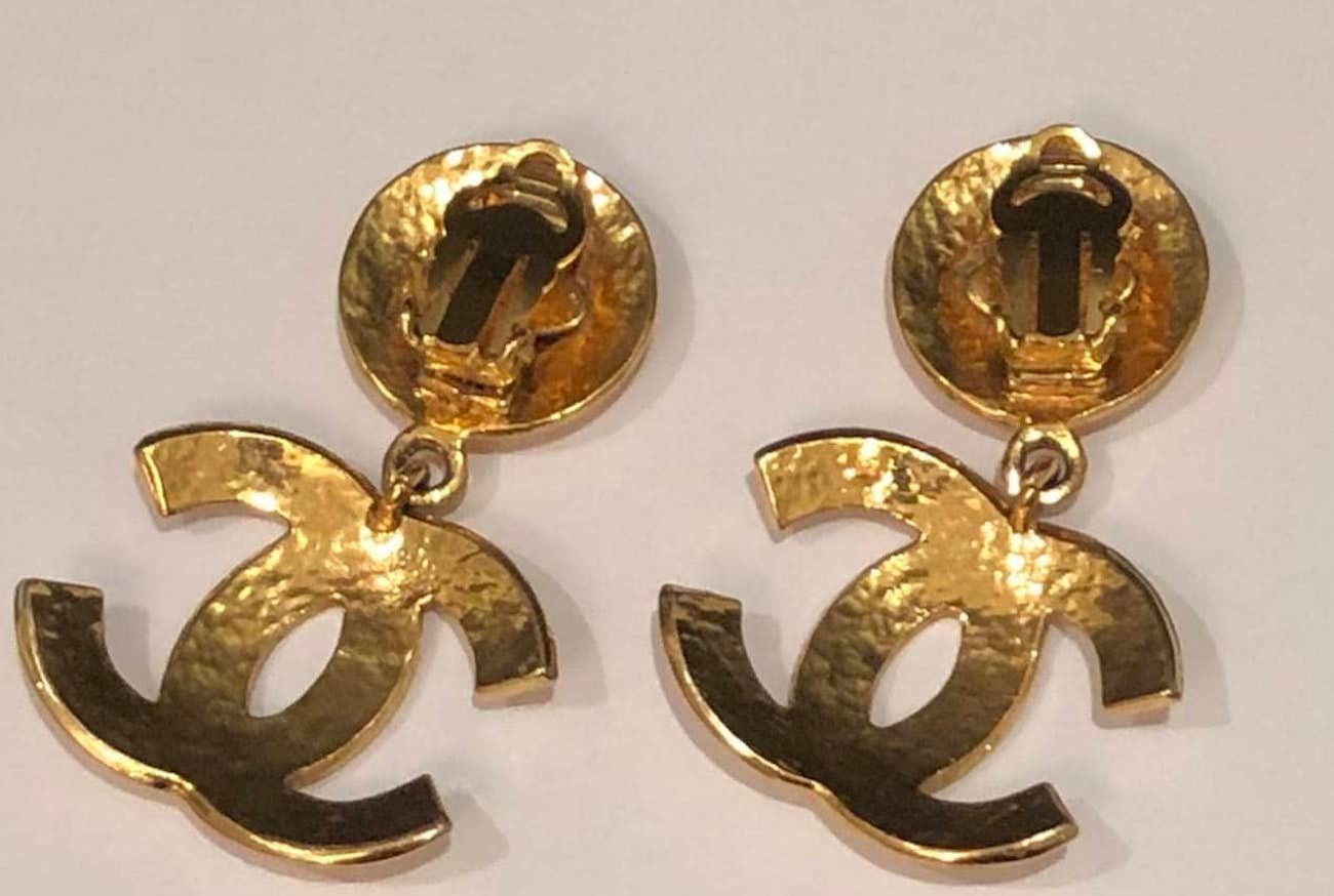 chanel logo dangle earrings