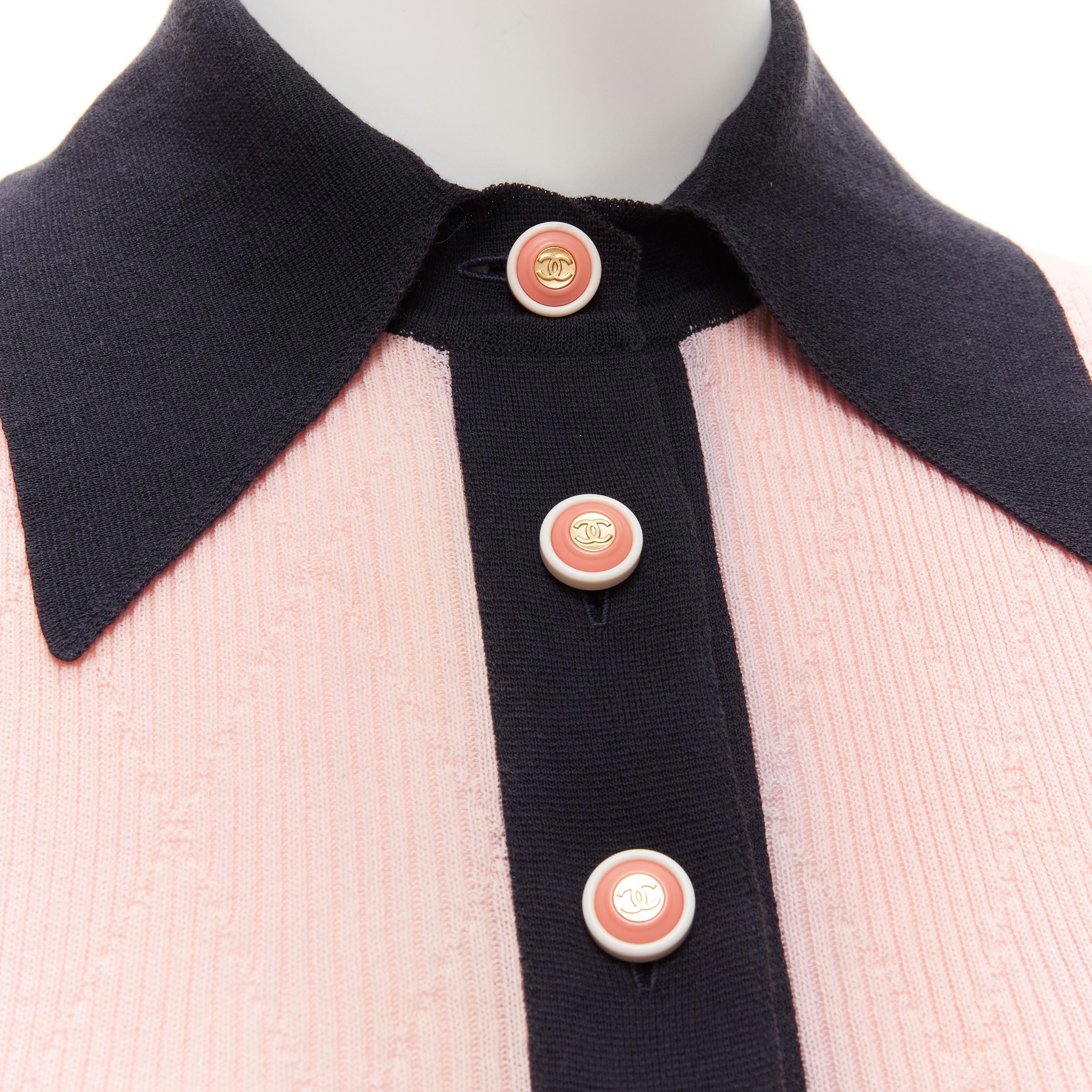 CHANEL CC logo gold tone button pink black knit collar polo top FR34 XS
Reference: TGAS/D00029
Brand: Chanel
Designer: Karl Lagerfeld
Material: Cotton
Color: Pink, Black
Pattern: Solid
Closure: Button
Extra Details: CC logo buttons.
Made in: