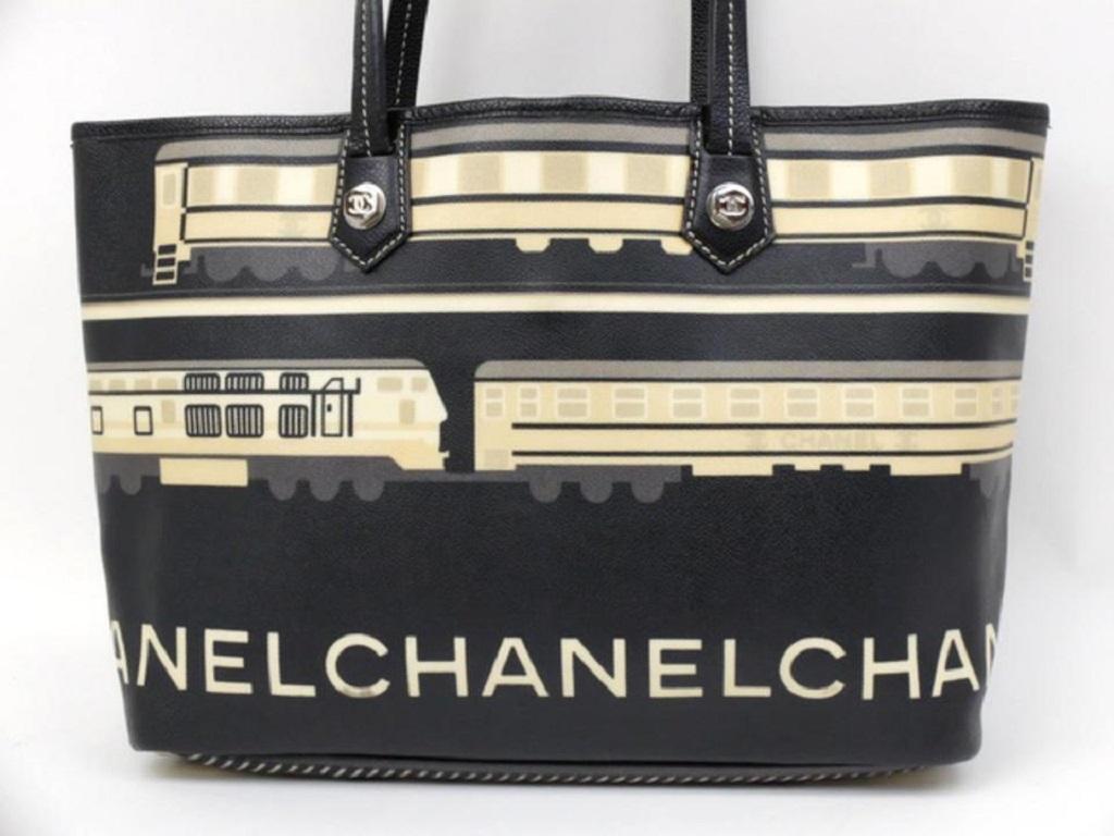 Chanel Cc Logo Le Tren Shopper 234425 Black Coated Canvas Tote In Good Condition For Sale In Dix hills, NY