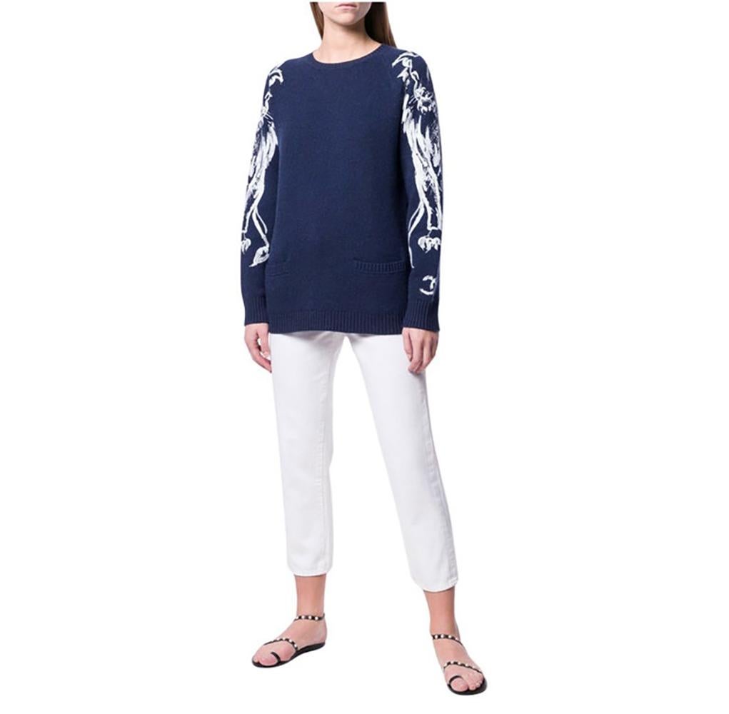 Chanel navy pure cashmere jumper hand painted with Lions (symbols of Chanel House) and CC logo. Size mark 34 FR. Condition is pristine, no signs of wear. 