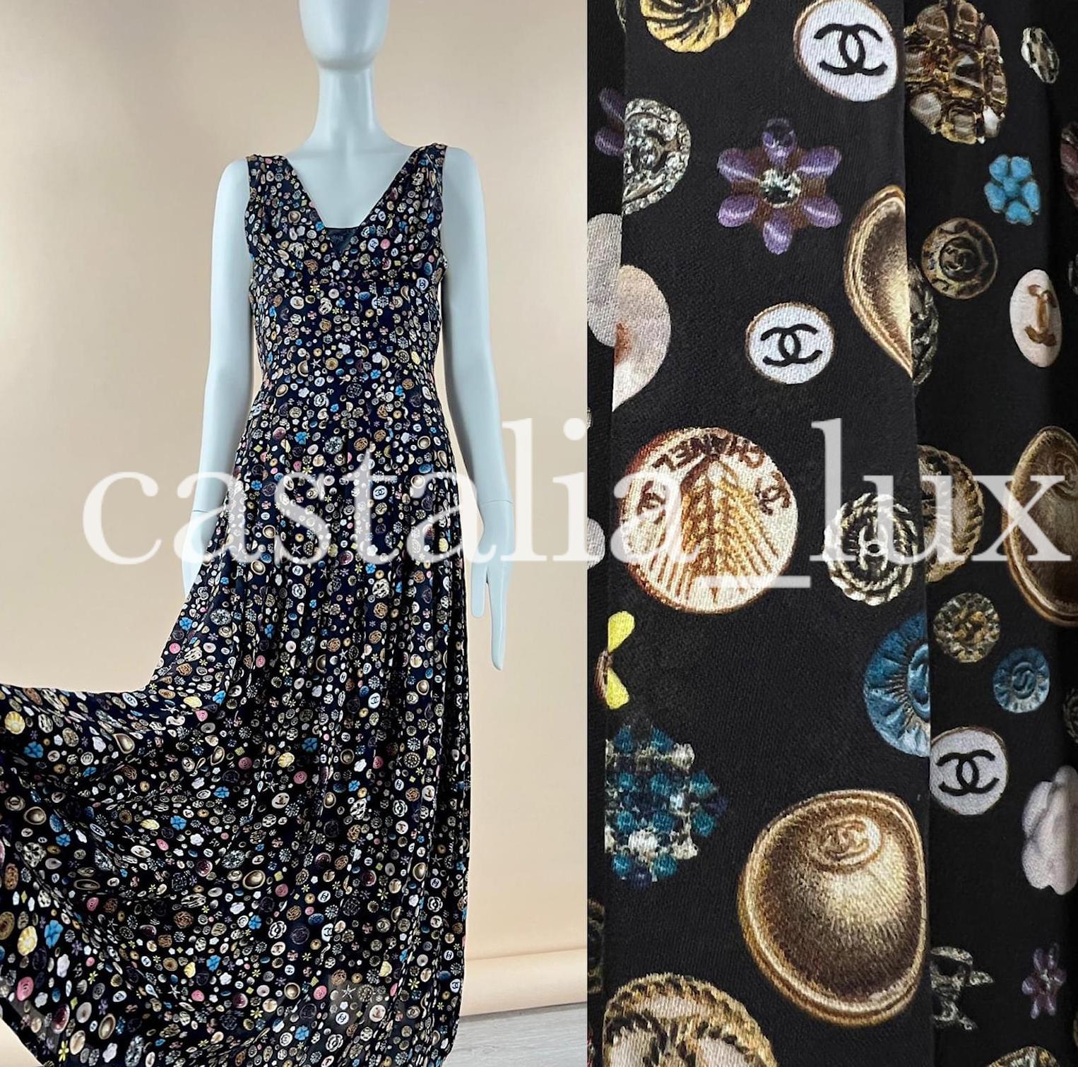 Stunning Chanel black silk maxi dress wit CC logo print. Retail price over 11,000 $ !
- insets of lamskin leather
- CC logo buttons
Size mark 34 fr. looks just magnificent!
Condition is pristine, only tried once, no signs of wear.