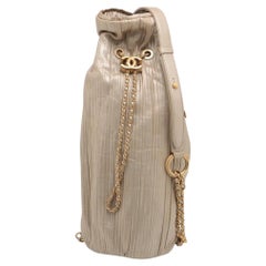 *Chanel CC Logo Metallic Calfskin Pleats Drawstring Two-Way Bag Gold