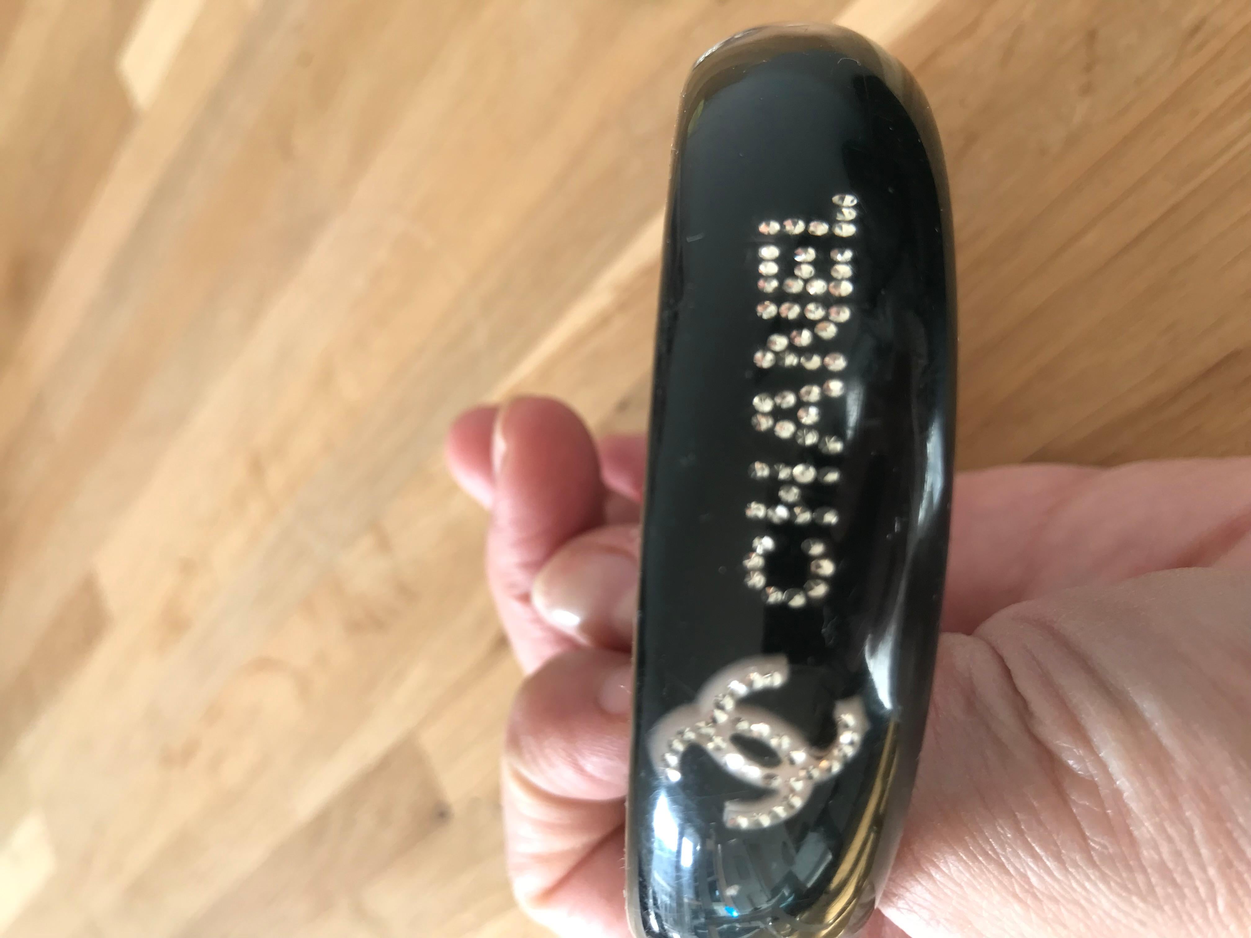 De las mujeres CHANEL. Conjunto de pulsera y anillo de brillantes con logotipo CC en venta