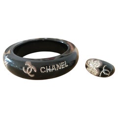 CHANEL. CC logo rhinestone bracelet and ring set