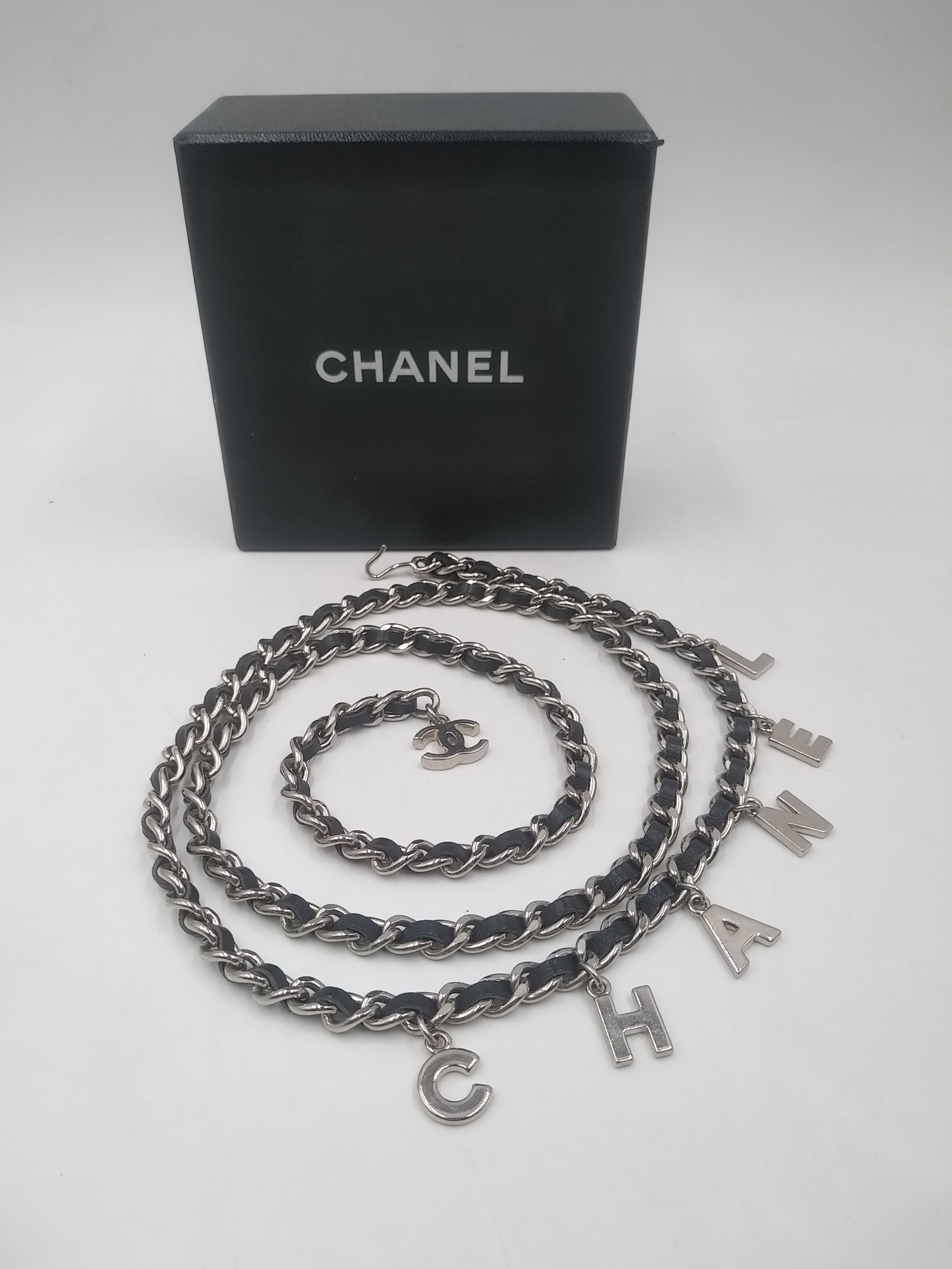 Chanel CC Logo Silver and Black Leather Letter Chain Belt Necklace Bracelet, 2006
- 100% authentic Chanel
- Black leather and metal
- Hook clasp closure
- Silvertone
- length 94 cm