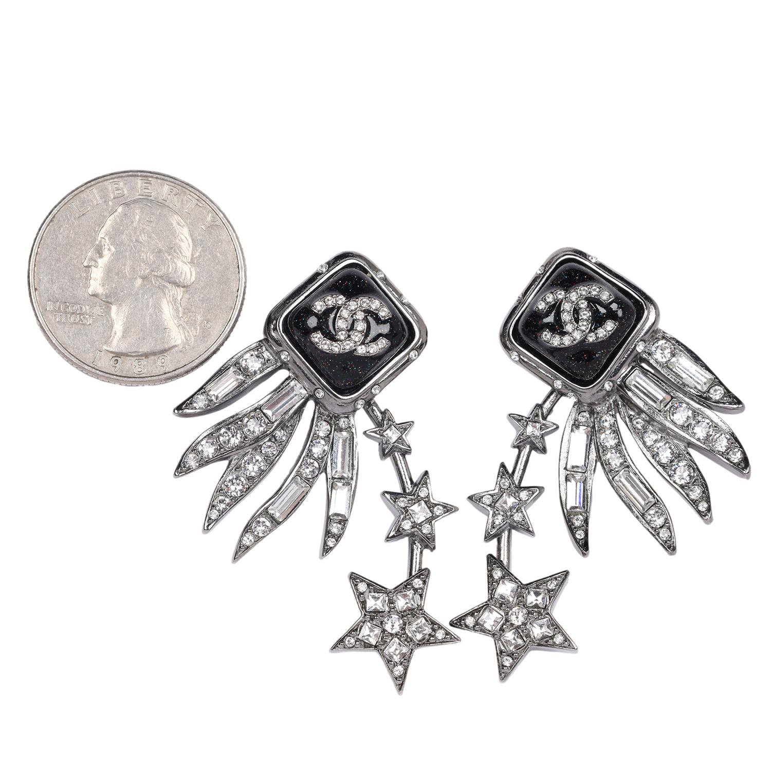 Authentic, pre-loved Chanel iconic CC logo silver star rhinestone chandelier pierced earrings. 

Made in France  Marked C21S

2.0