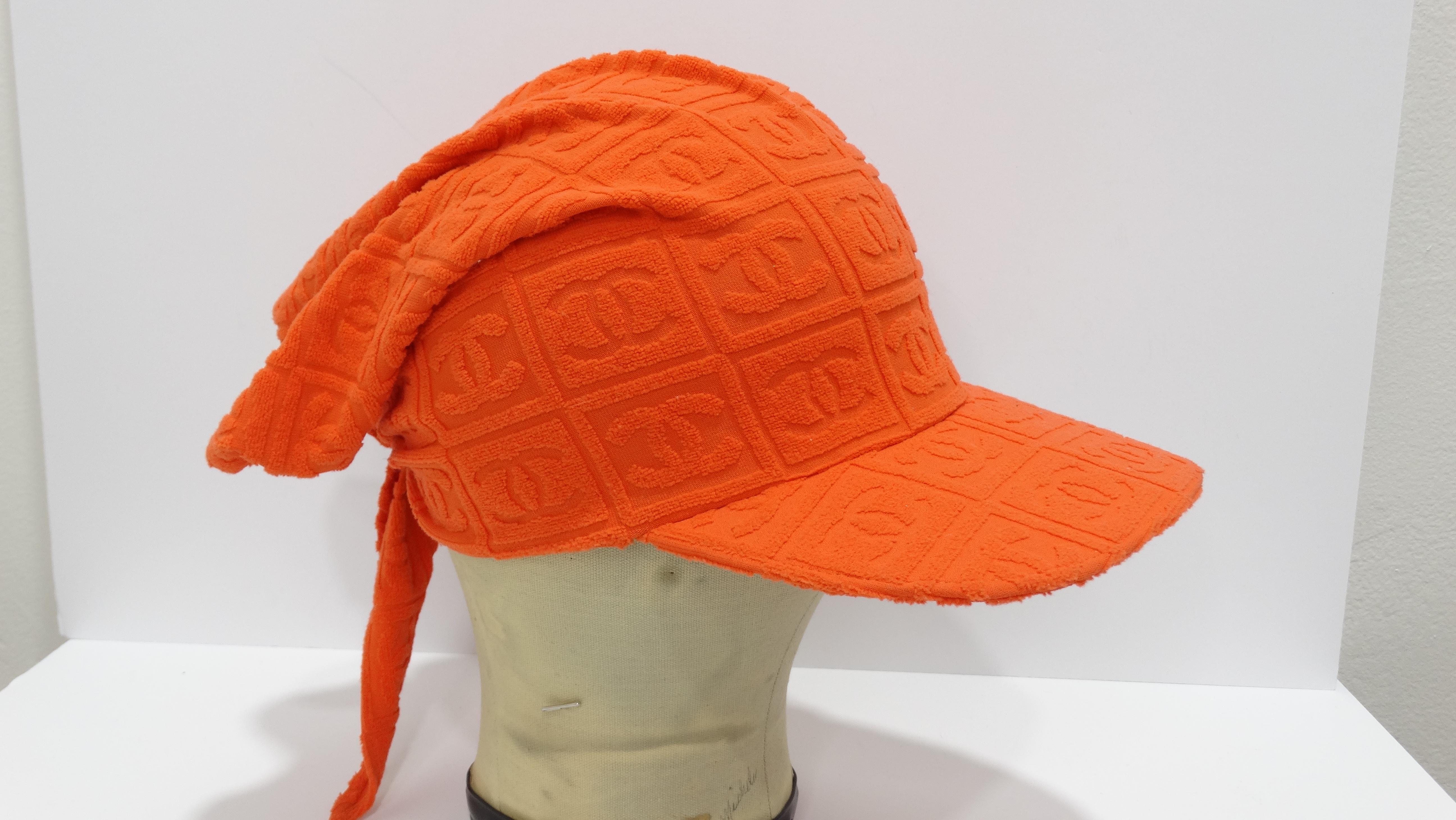 Chanel & Terrycloth collide! Look no further for your new summer time accessory. This unique and bold hat mixes the iconic 