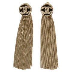 Chanel CC Long Earrings in Champagne Metal at 1stDibs