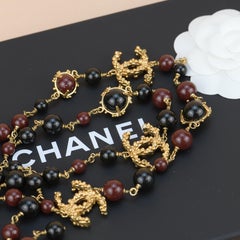 Chanel CC Long Strand Burgundy and Black Pearl Necklace