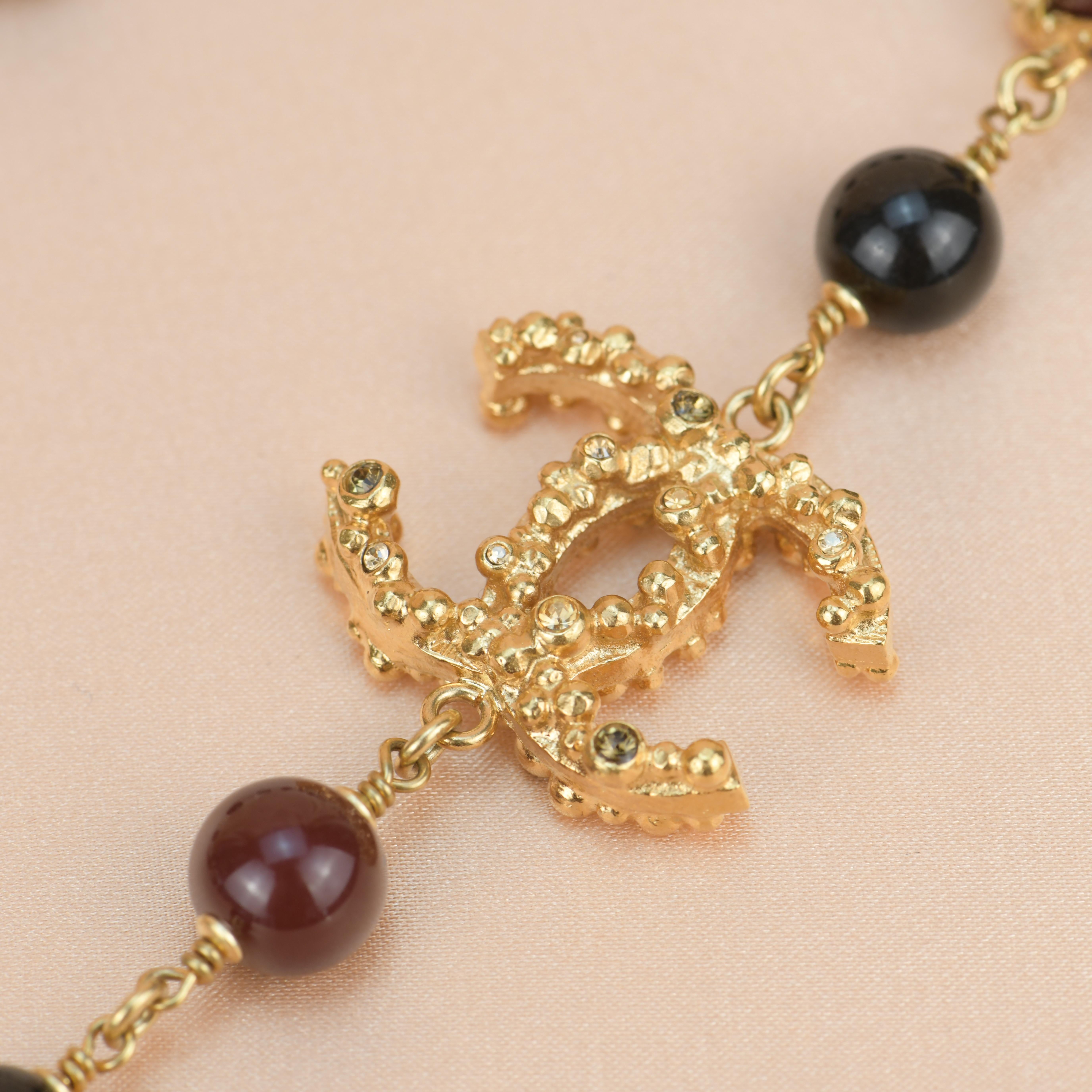 Women's or Men's Chanel CC Long Strand Burgundy and Black Pearl Necklace