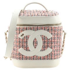 Chanel CC Mania Waschtischtasche aus Tweed mit Lammfell