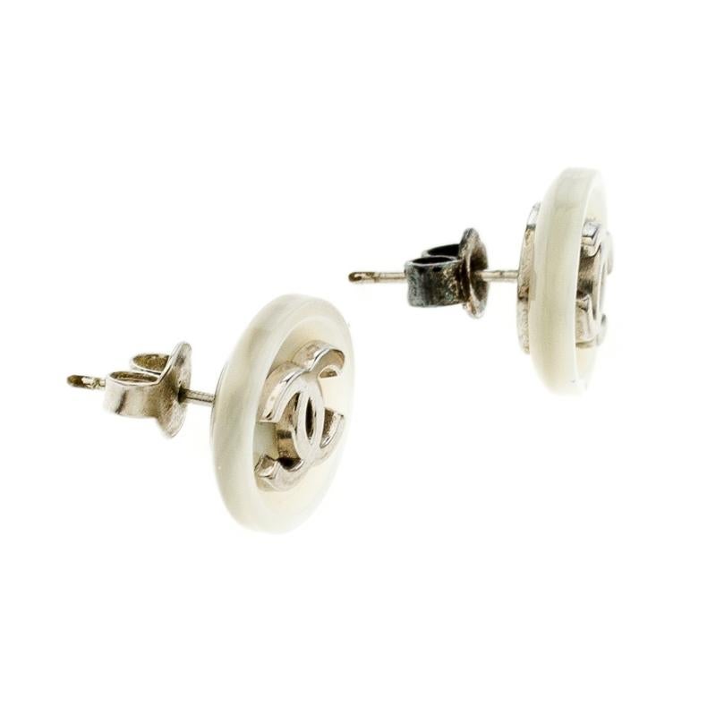 These stud earrings from Chanel are sure to brighten your heart. They bring a design of round Mother of Pearl buttons detailed with the timeless CC logo. The earrings are sure to add the luxury touch on any occasion.

Includes: The Luxury Closet