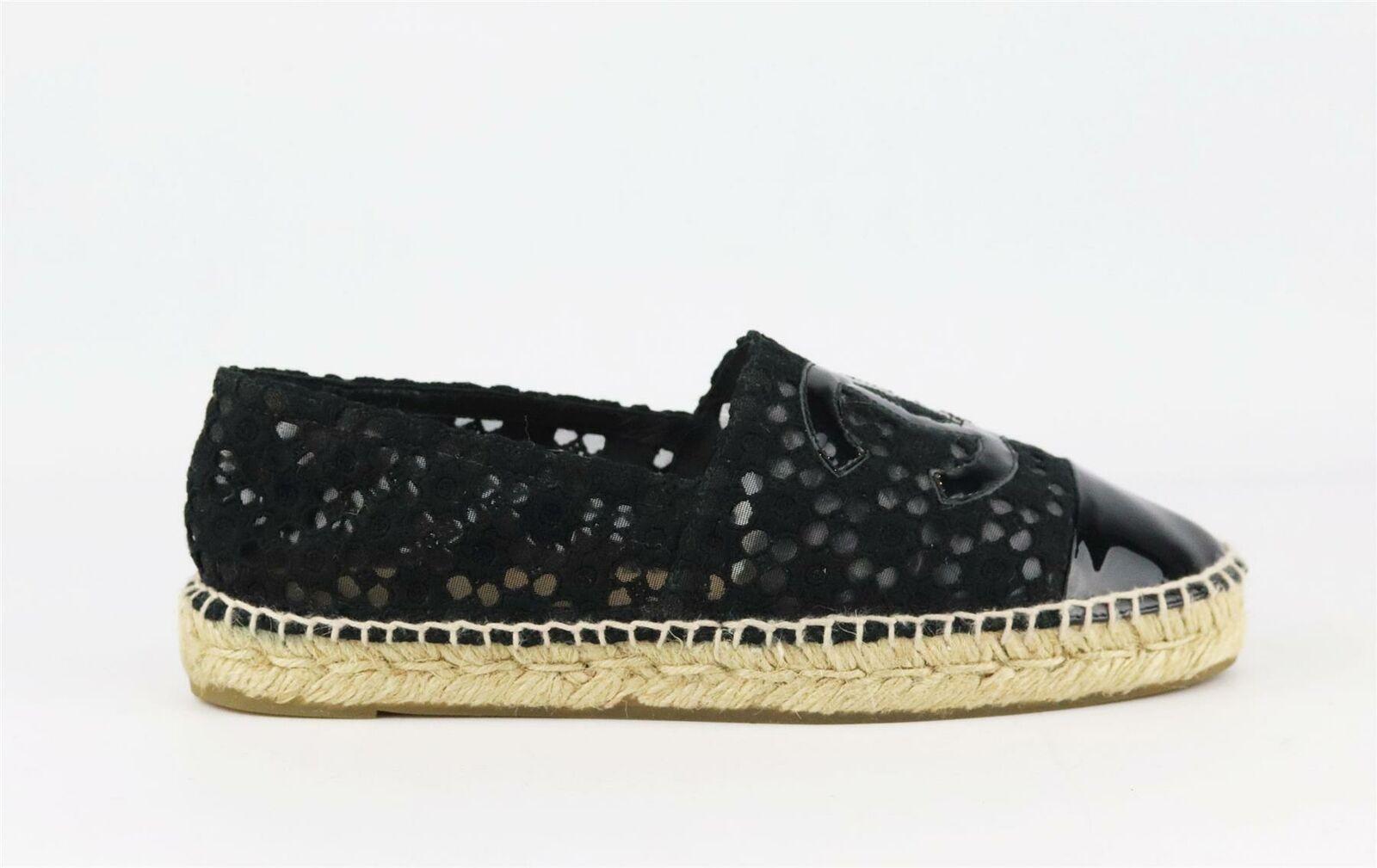 Chanel's classic espadrilles in black crochet, featuring the brand's trademark interlocking CC logo on the front in a black patent leather, they have a thick jute sole and a reinforced toe which offers a comfortable and supportive fit.
Sole measures