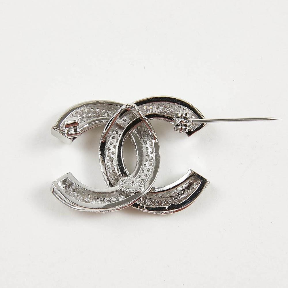 chanel silver brooch