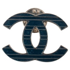 Chanel cc pin label by Karl Lagerfeld circa 2015