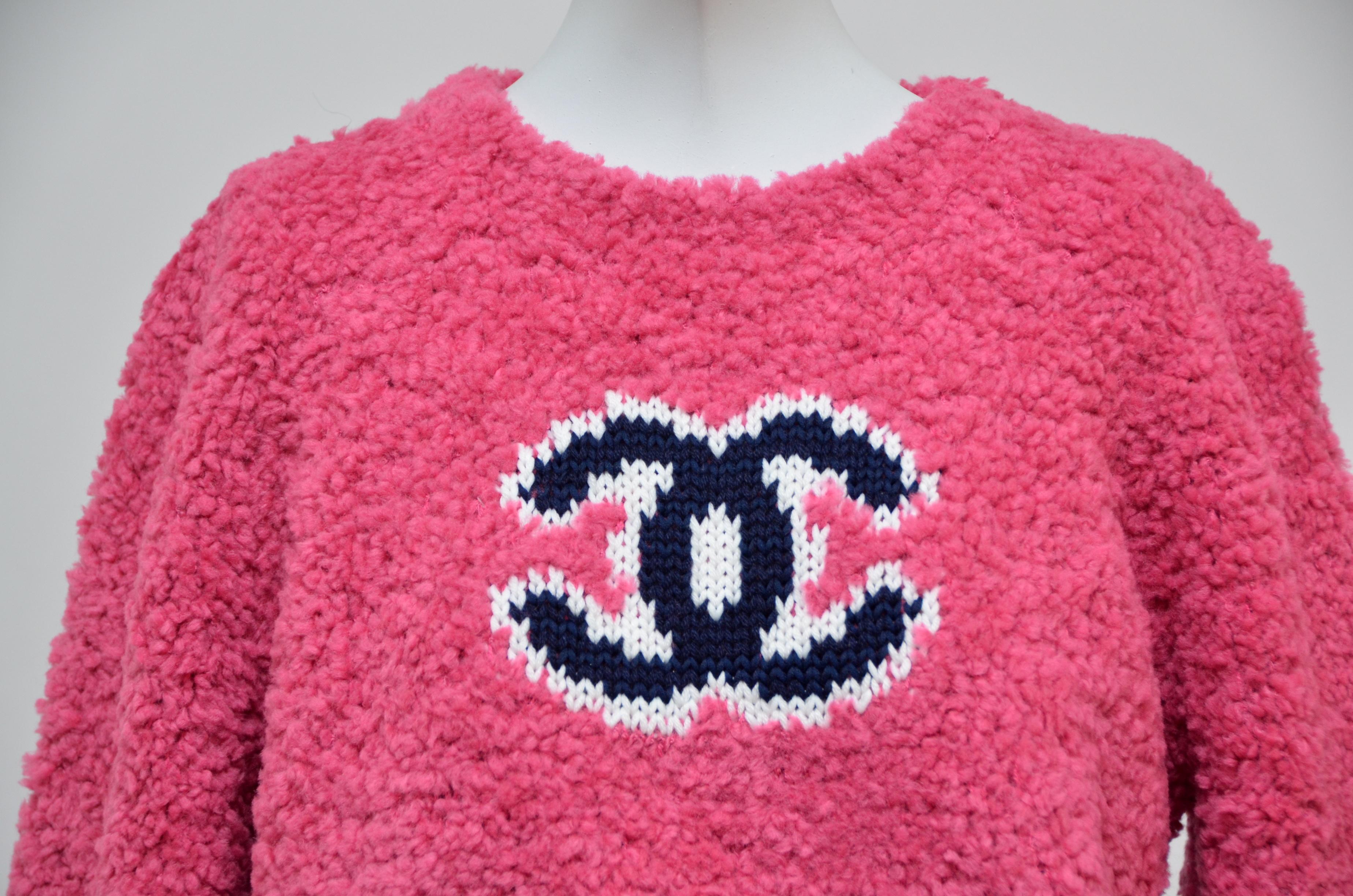 Chanel teddy sweater in pink tone 
Due to flashlight color tone might vary in person.
New with tags.Original receipt with personal info covered is available to purchaser upon request
Size 40FR.Please familiarize yourself with Chanel sizing before
