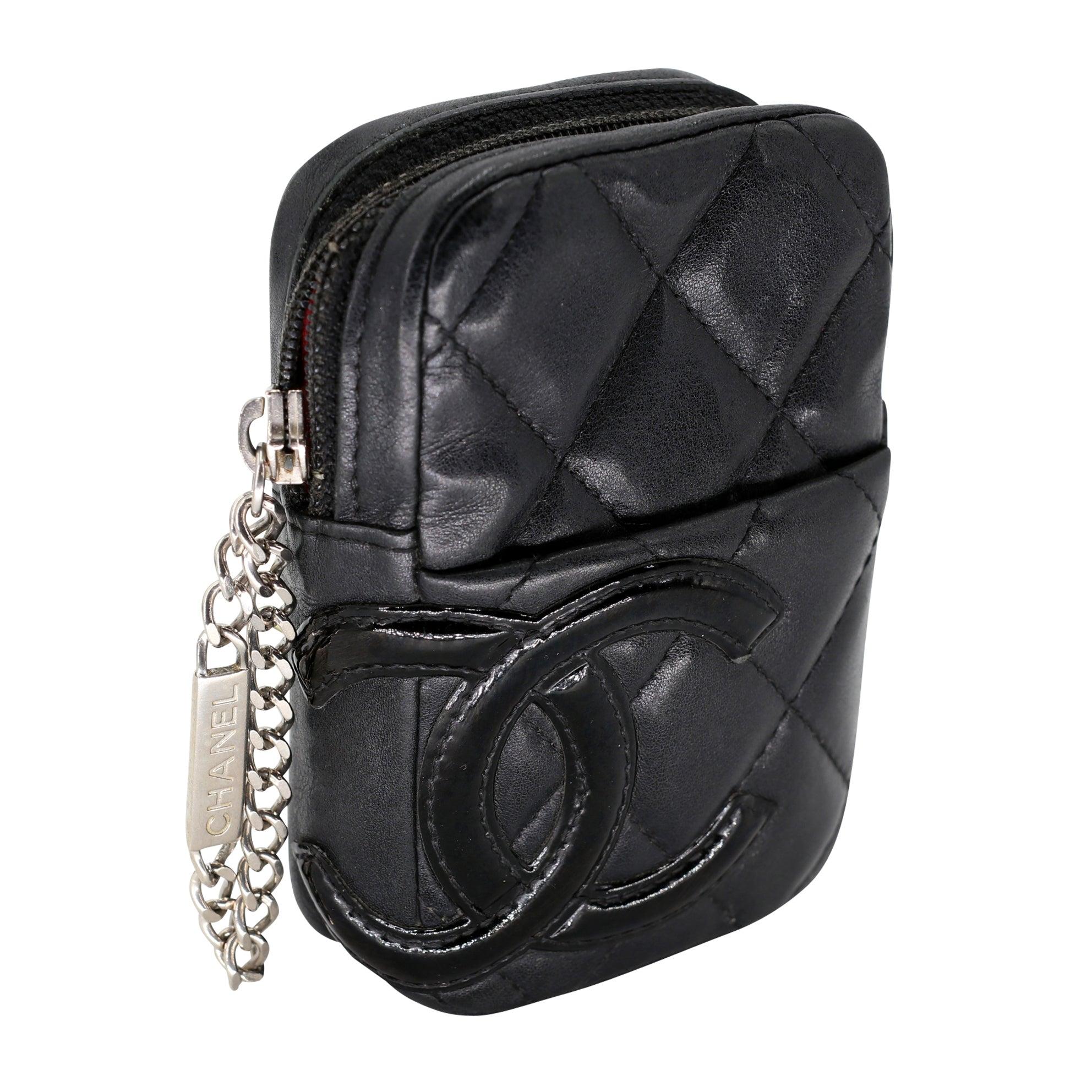 If you are seeking a luxurious and chic way to organize your essentials coins and credit cards, look no further than this gorgeous Chanel Quilted Lambskin Leather Zip pouch. This stunning piece features a single wrap around zip closure with the