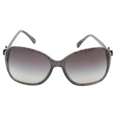 Chanel CC Sonnenbrille mit Schleife Schwarz