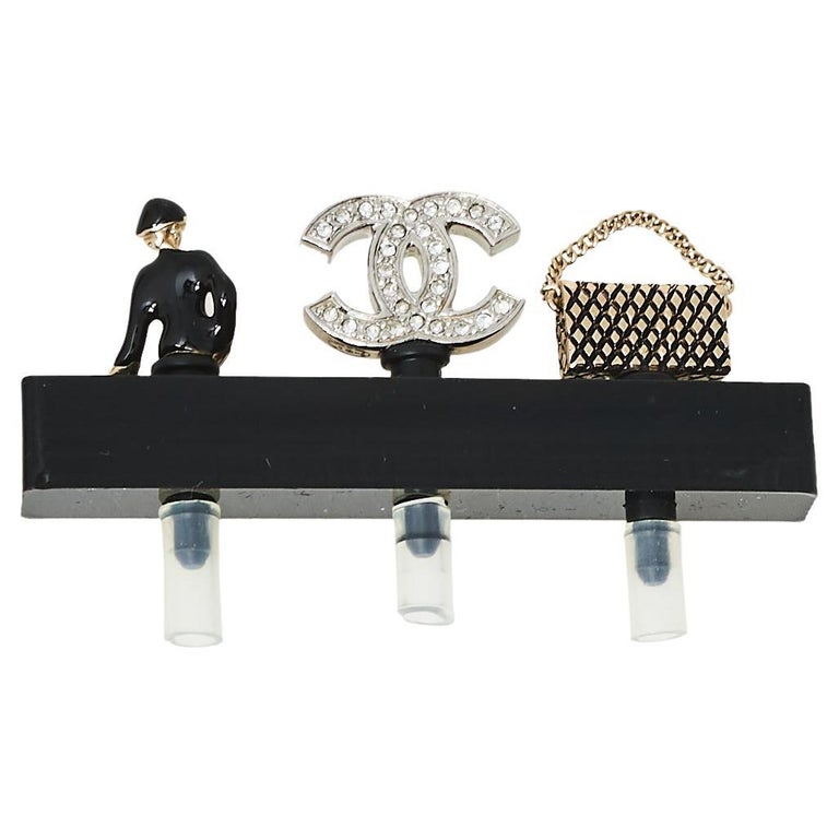 Chanel CC Smartphone Dust Plugs, A Set Of Three Charms at 1stDibs