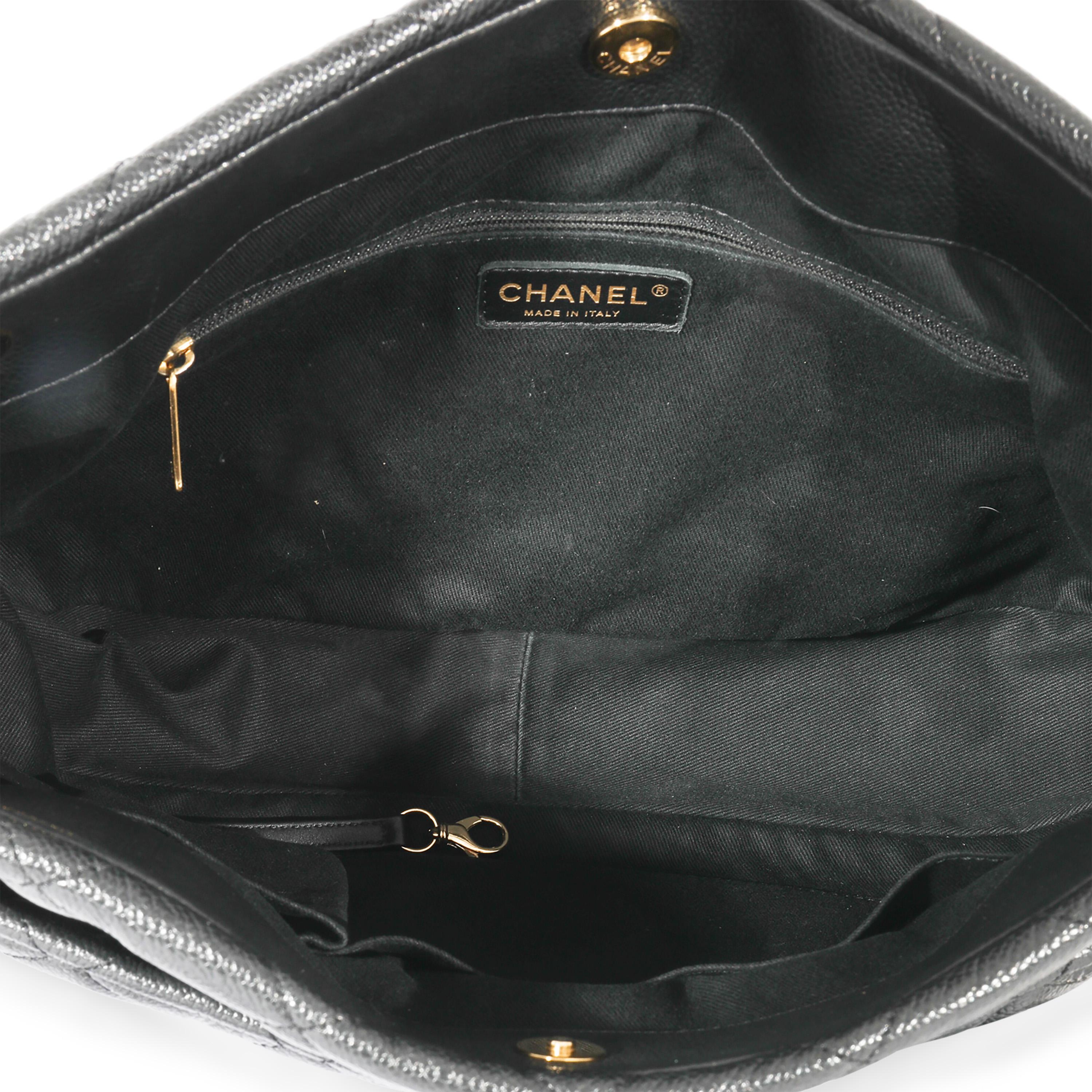 Listing Title: Chanel CC Soft Timeless Black Caviar Tote
SKU: 127605
Condition: Pre-owned 
Handbag Condition: Very Good
Condition Comments: Very Good Condition. Exterior heavy scuffing and at corners. Scratching at hardware. Light interior