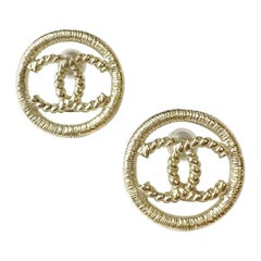 CHANEL CC Stud Earrings in Gilt Metal