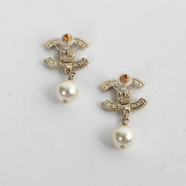 CHANEL CC Stud Earrings in Gilt Metal, Pearl and Rhinestones at 1stDibs  chanel  earrings pearl and diamond, chanel pearl earrings, chanel earrings cc  diamond