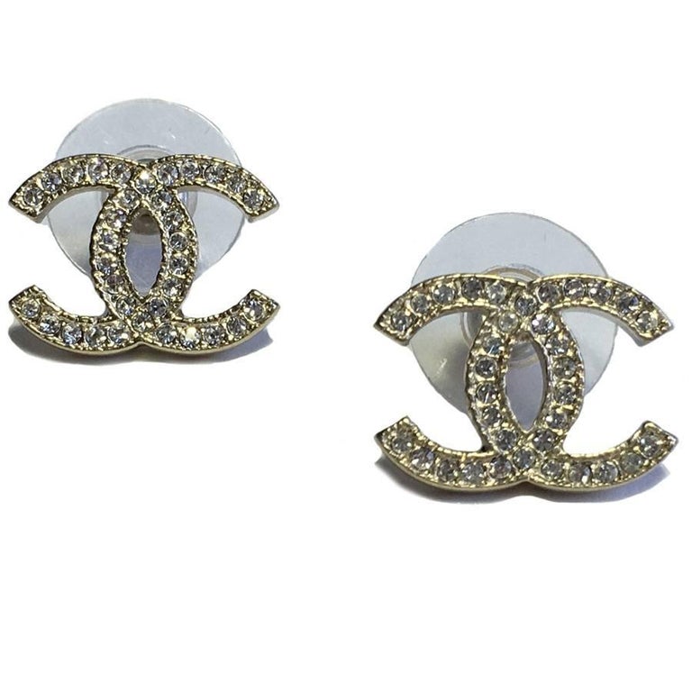 CHANEL CC Stud Earrings in Pale Gilded Metal set with Rhinestones