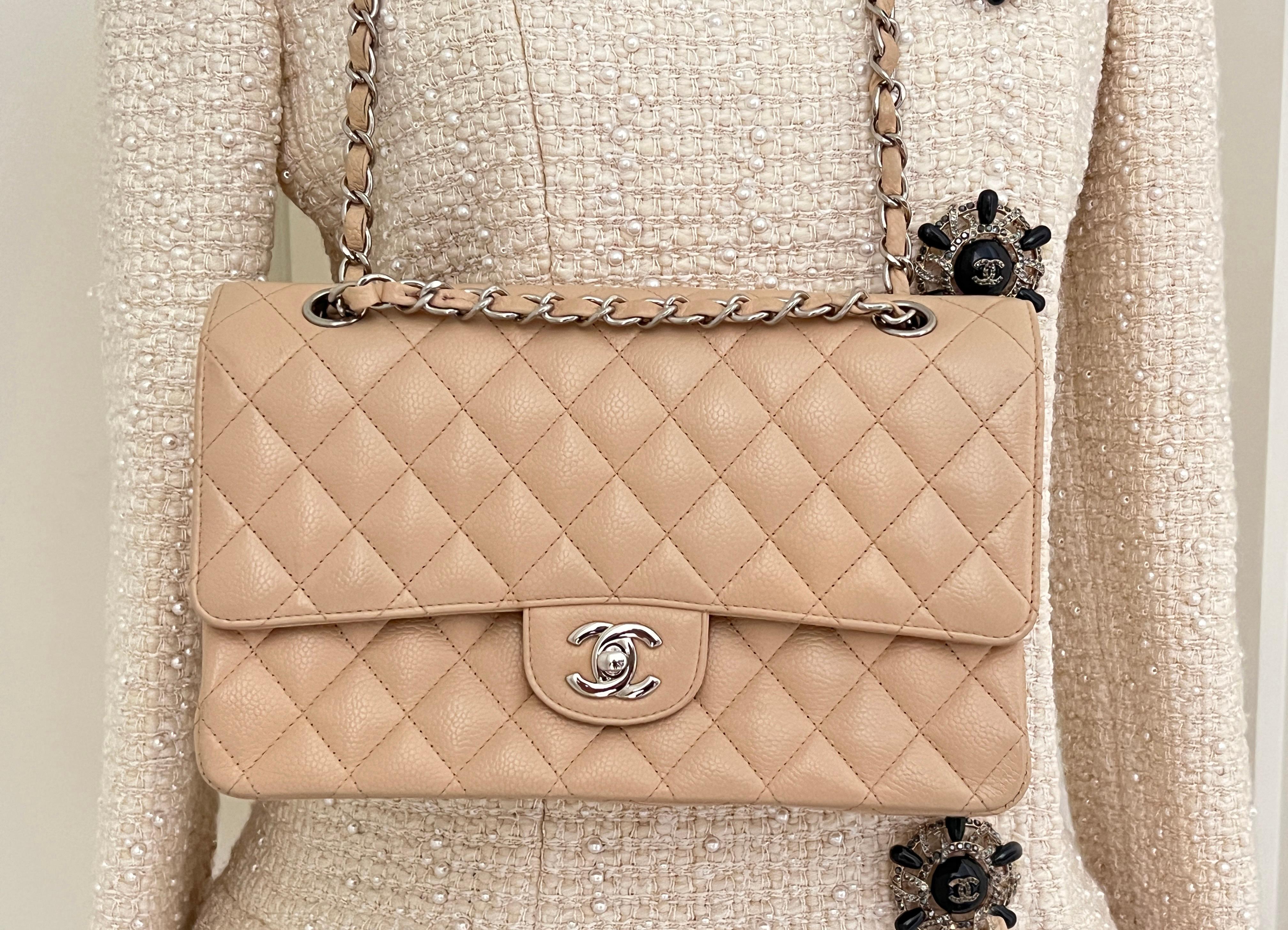 Stunning beauty Chanel CC Timeless Double Flap Bag in beige caviar leather with silver-tone hardware. 
Came out only once, condition is pristine, corners are pristine. Comes with dustbag. Size 25 cm wide, 16 cm high.
There is also a certificate of
