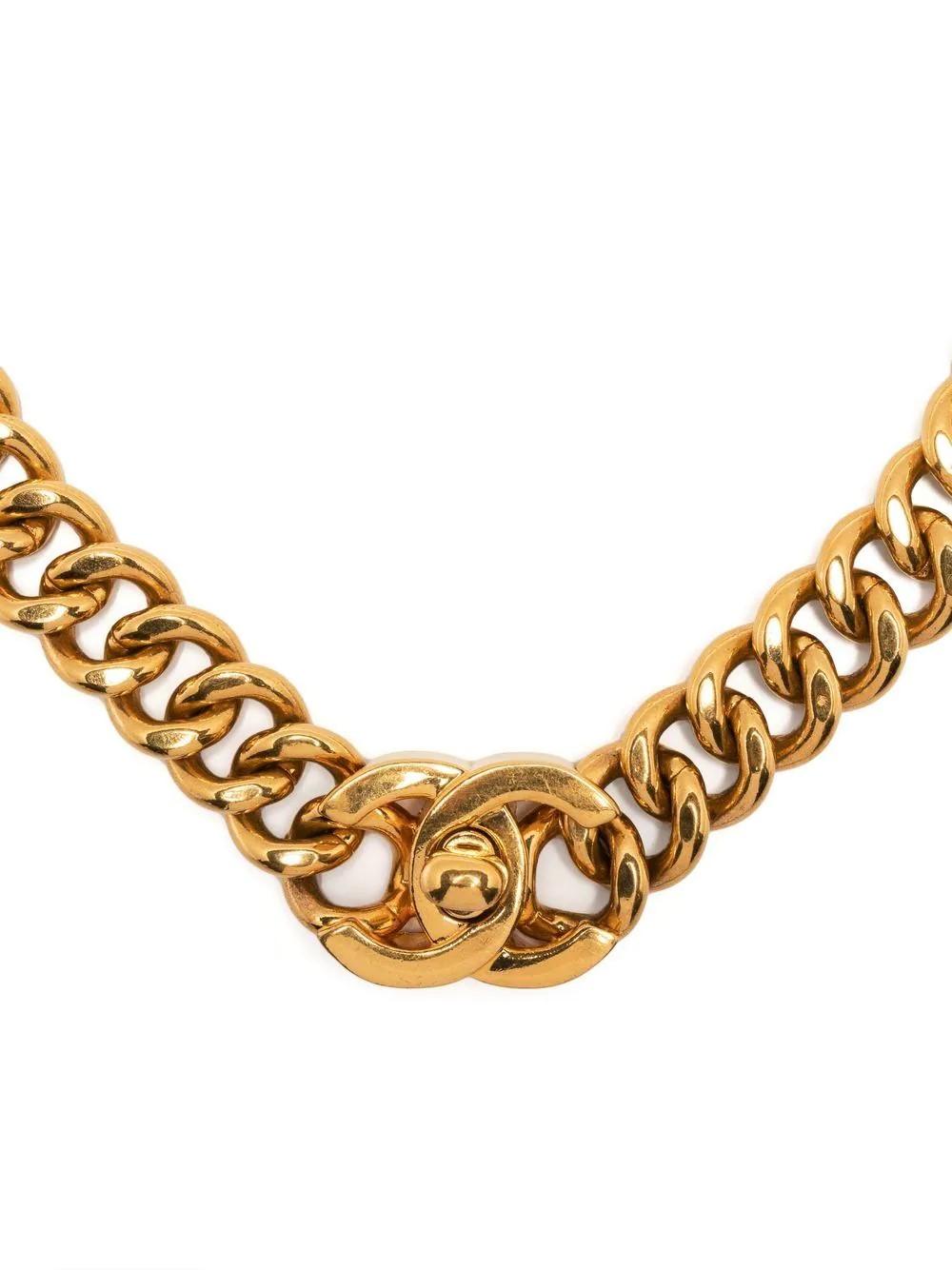 This is a necklace that can't go wrong. Chunky, gold and has the iconic double CC turn-lock, you can't find better. The CC turn-lock is a staple Chanel feature seen in many of the classic Chanel handbag styles, here we see it transformed into a