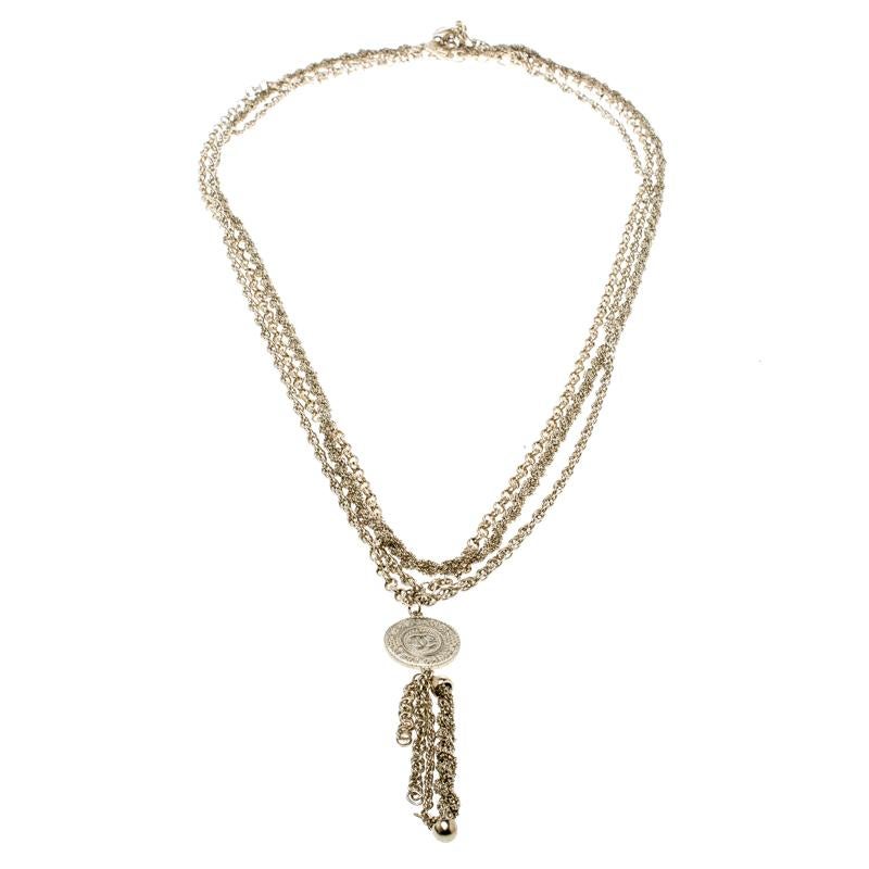 To adorn with style and a little touch of vintage fun, Chanel brings you this layered necklace that has been made from silver-tone metal. It is a piece that will naturally evoke your love as it is well made and it comes with layers of chains and a
