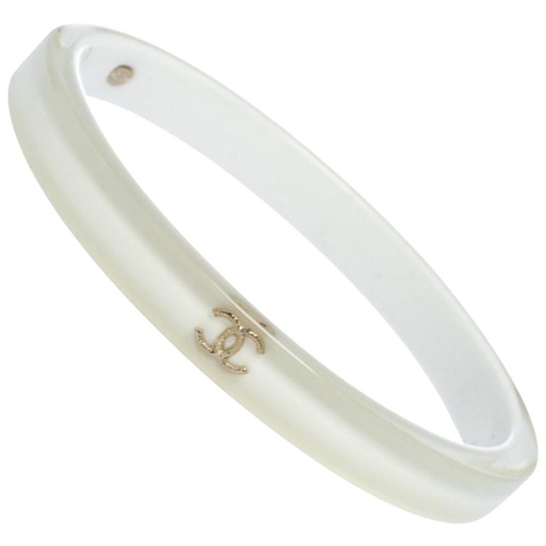 Chanel CC White Resin Bangle Bracelet at 1stDibs