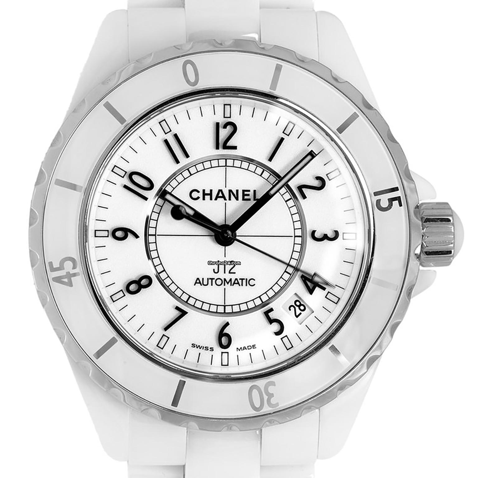 Pre-Owned Chanel J12 ceramic and stainless steel case with a ceramic bracelet. Fixed bezel. White dial with white hands and stainless steel index - Arabic numerals hour markers. Dial Type: Analog. Date display between 4 o'clock and 5 o'clock