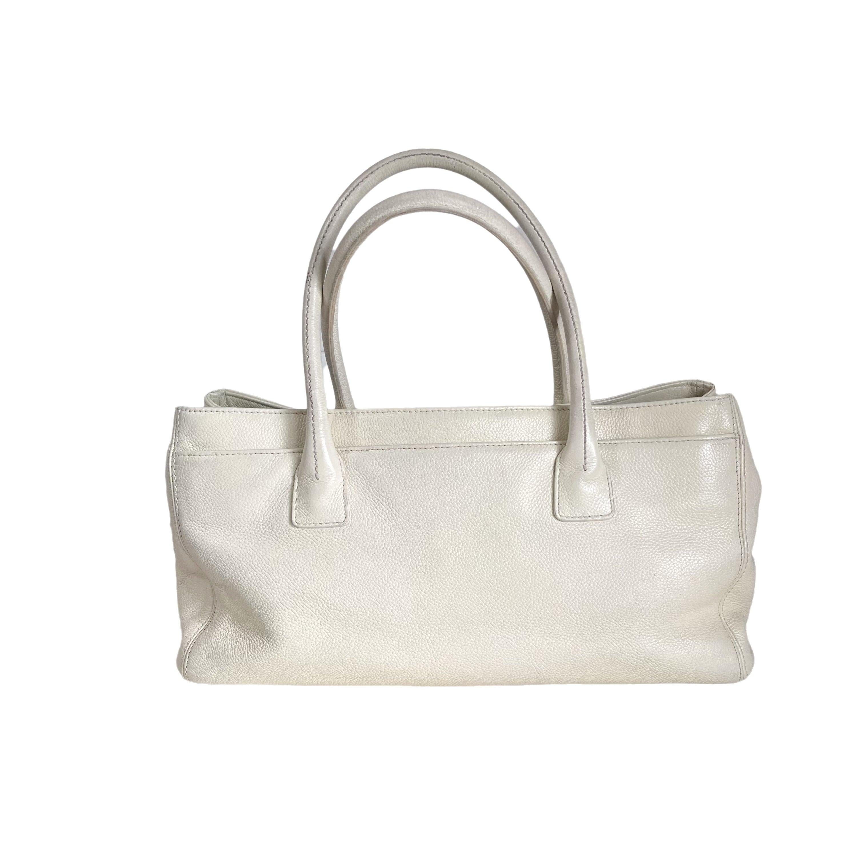 Chanel Cerf Executive East West Small White Caviar Leather Handbag These are professional photos of the actual bag offered by Luxbags. The iconic Chanel Cerf tote was introduced in 2005 as a timeless addition to Chanel's renowned classic collection.