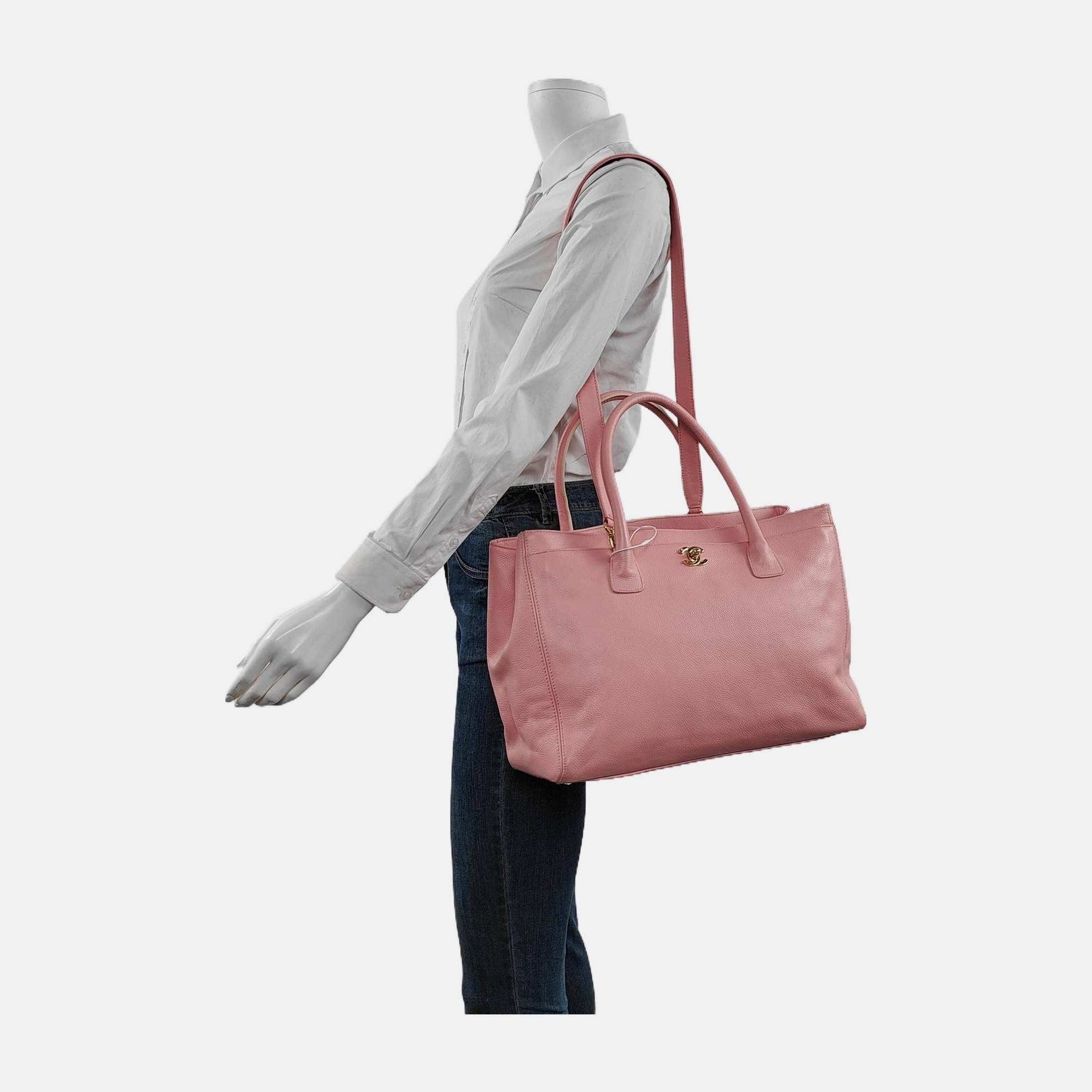 The iconic Chanel Cerf tote was introduced in 2005 as a timeless addition to Chanel's renowned classic collection. Crafted from high quality caviar leather in rare pink color, featuring elongated leather top handles, a Mademoiselle turn lock, this