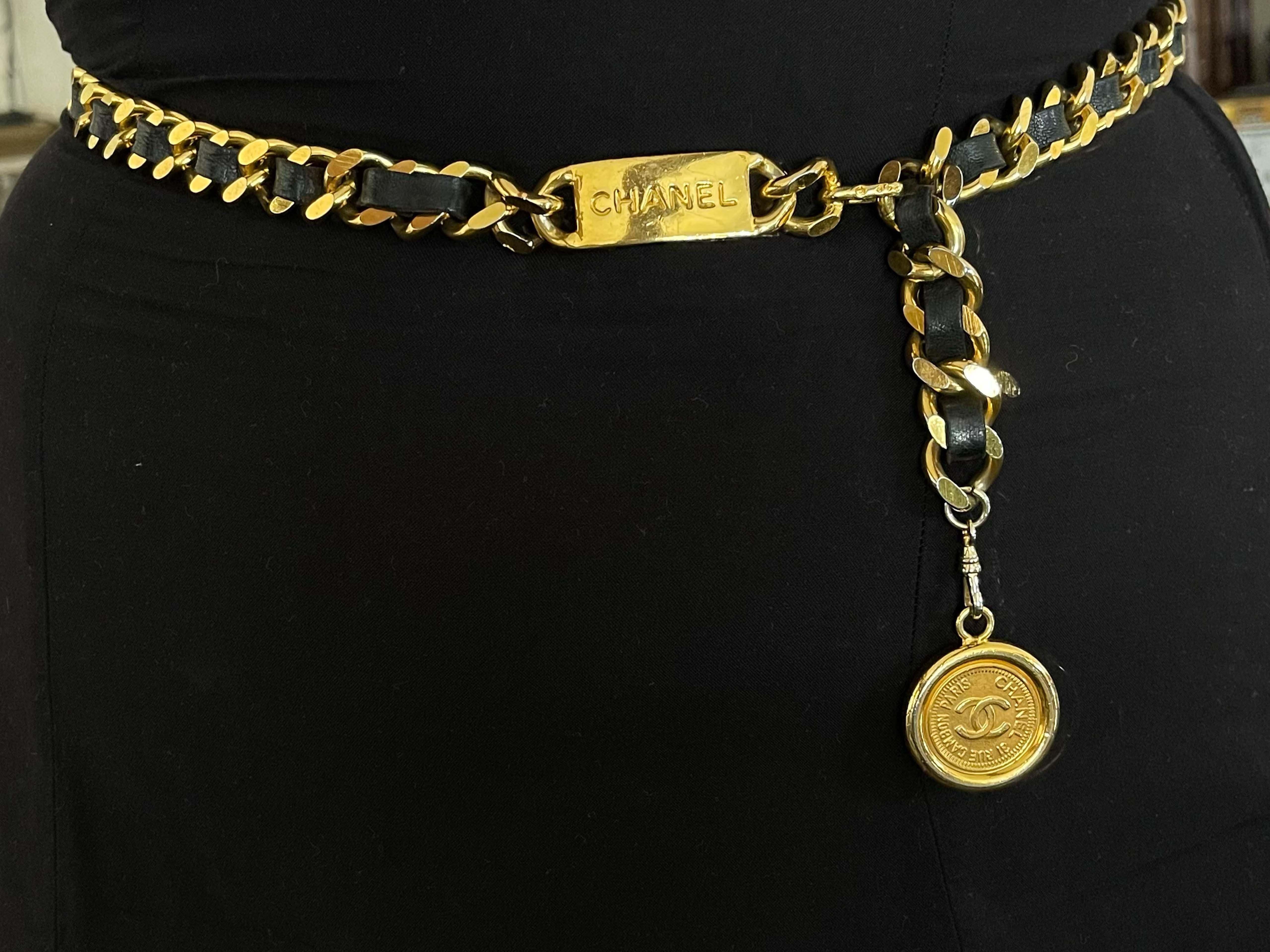 Classic and chic, this vintage Chanel chain leather belt is crafted in gold-plated metal, accented with a 'CC' logo-engraved medallion pendant. Closure can be hooked on multiple links for a variety of fits.

Brooch Specifications:

Designer: