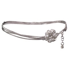 Chanel, Chain belt/necklace with rhinestone Camellia.