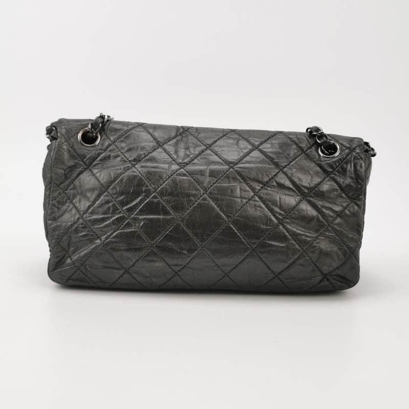 Chanel Chain Me Chain Around Medium Flap Bag Shiny Black Calfskin Leather, 2012
 These are professional photos of the actual bag.
 CONDITION: VERY GOOD CONDITION
 This preloved authentic Chanel bag is in very good original condition. Light rubbing