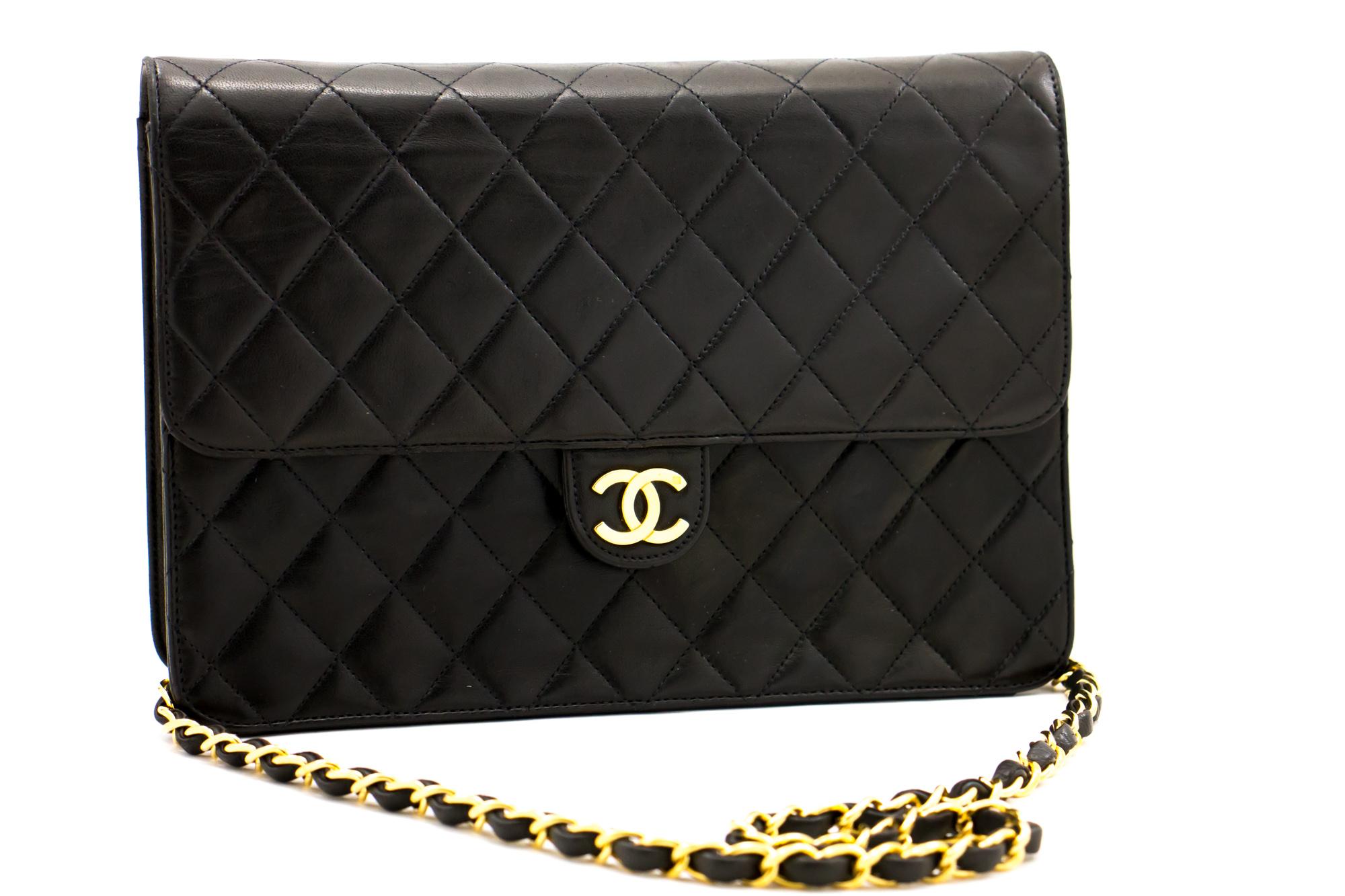 An authentic CHANEL Chain Shoulder Bag Clutch Black Quilted Flap made of black Lambskin. The color is Black. The outside material is Leather. The pattern is Solid. This item is Vintage / Classic. The year of manufacture would be