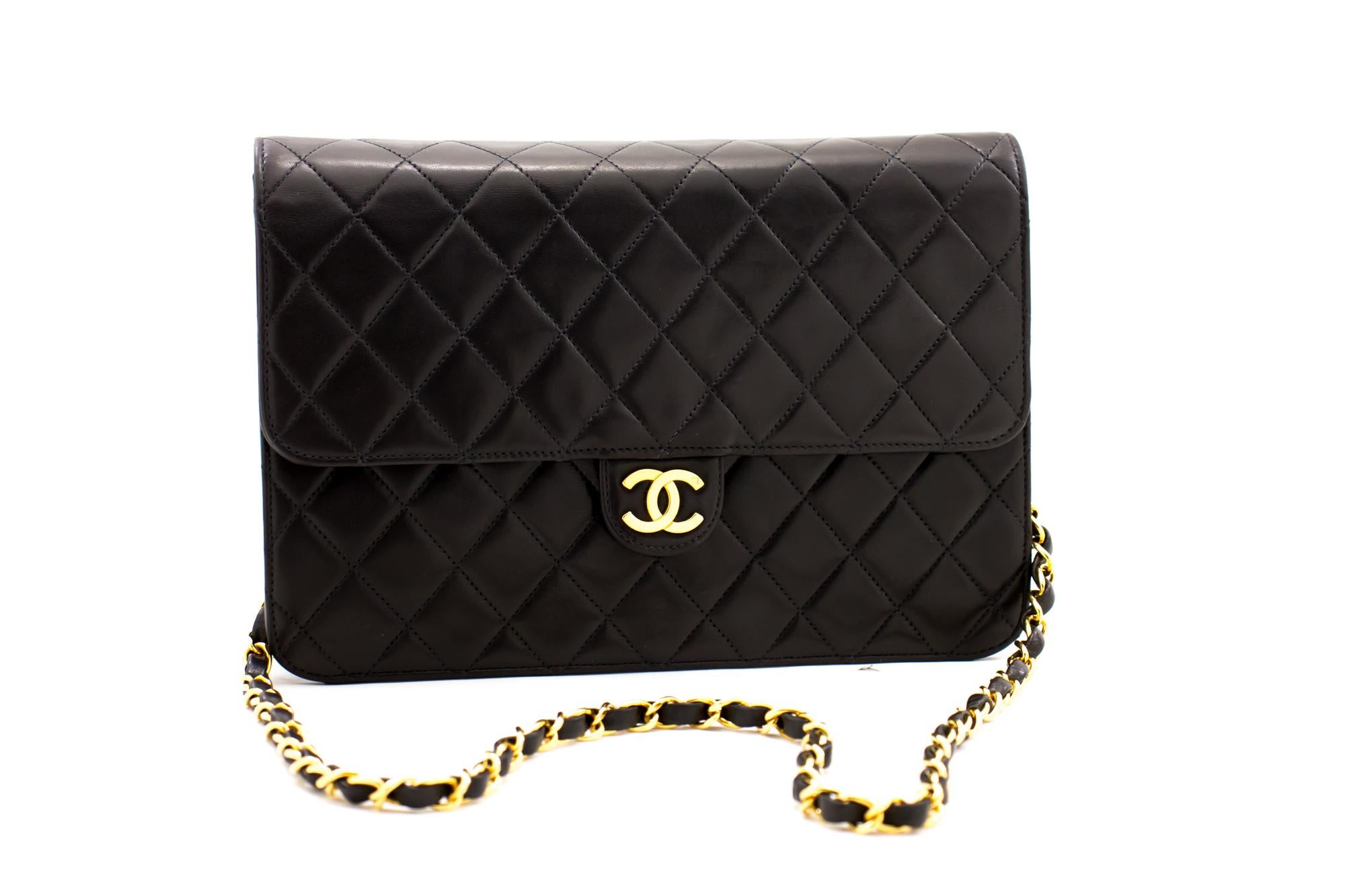 An authentic CHANEL Chain Shoulder Bag Clutch Black Quilted Flap made of black Lambskin. The color is Black. The outside material is Leather. The pattern is Solid. This item is Vintage / Classic. The year of manufacture would be