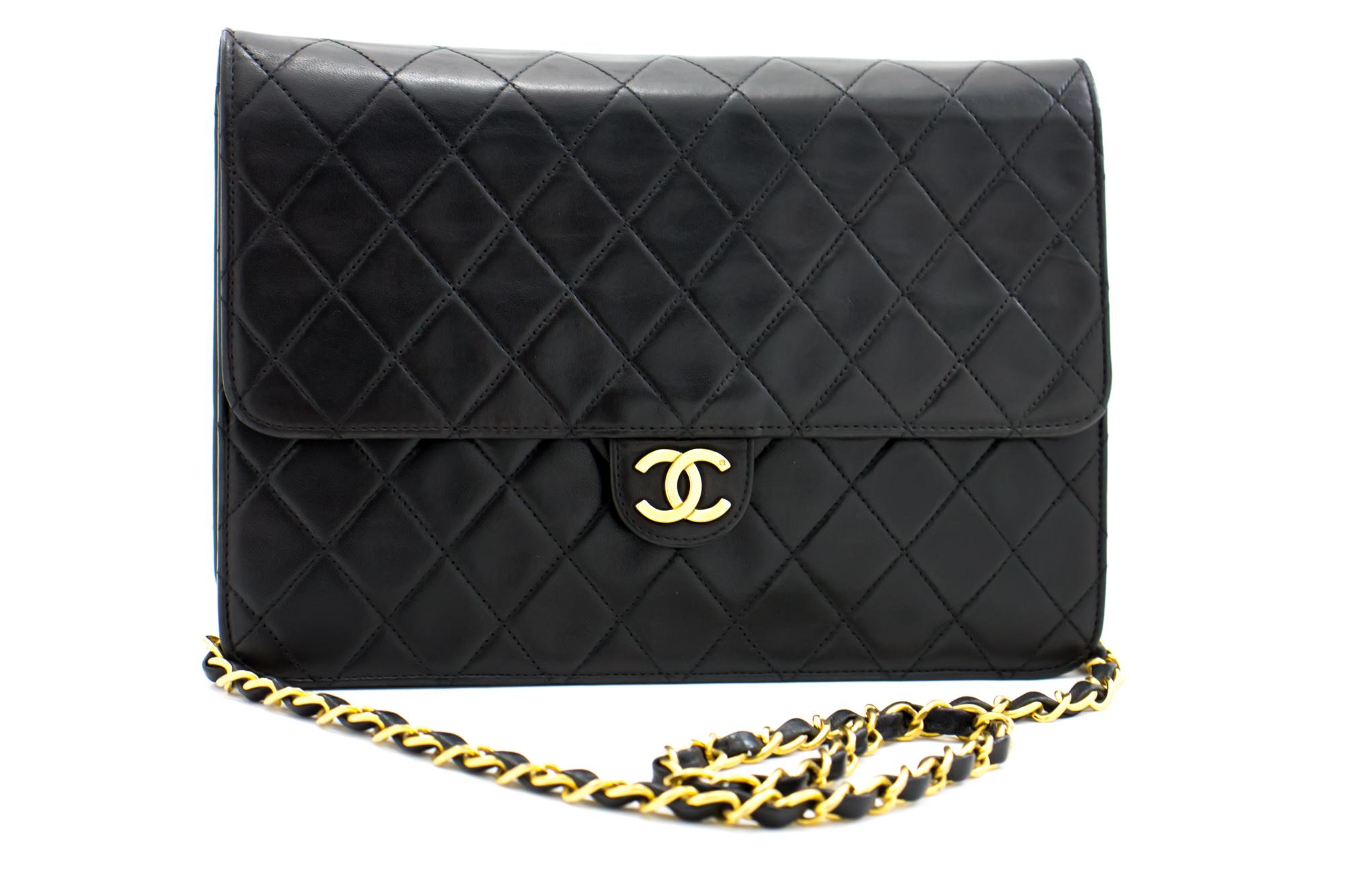 An authentic CHANEL Chain Shoulder Bag Clutch Black Quilted Flap made of black Lambskin Purse. The color is Black. The outside material is Leather. The pattern is Solid. This item is Vintage / Classic. The year of manufacture would be