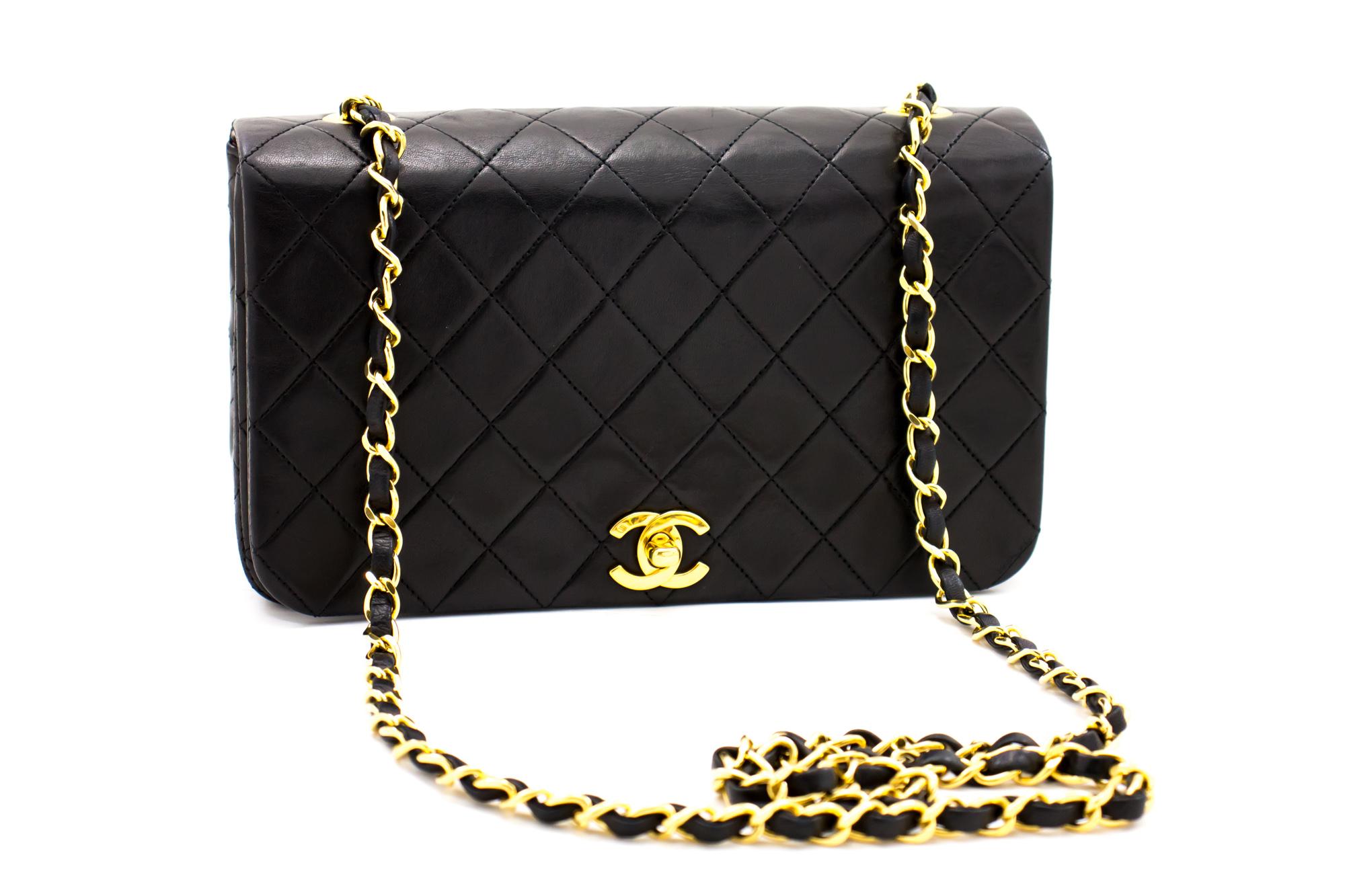 An authentic CHANEL Chain Shoulder Bag Crossbody Black Quilted Flap made of black Lambskin. The color is Black. The outside material is Leather. The pattern is Solid. This item is Vintage / Classic. The year of manufacture would be