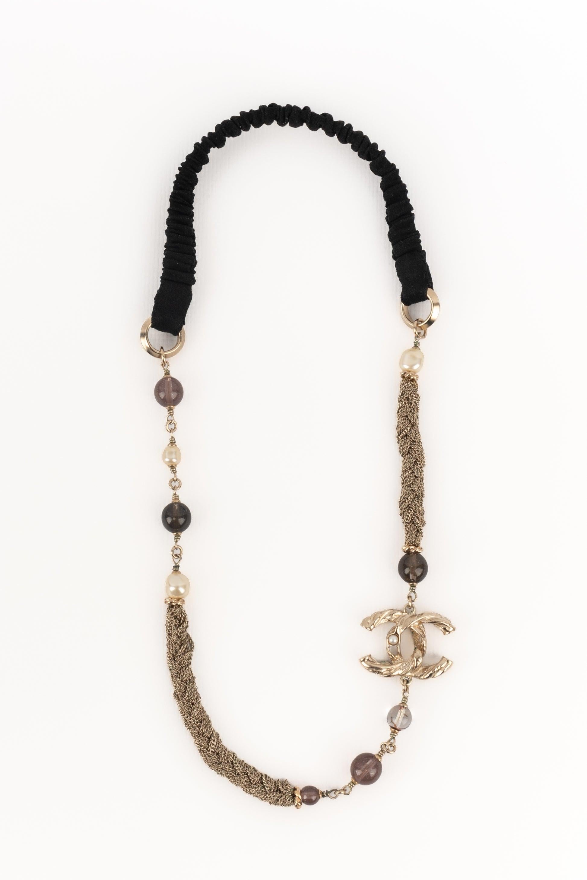 Chanel Champagne Metal Head Jewelry In Excellent Condition In SAINT-OUEN-SUR-SEINE, FR