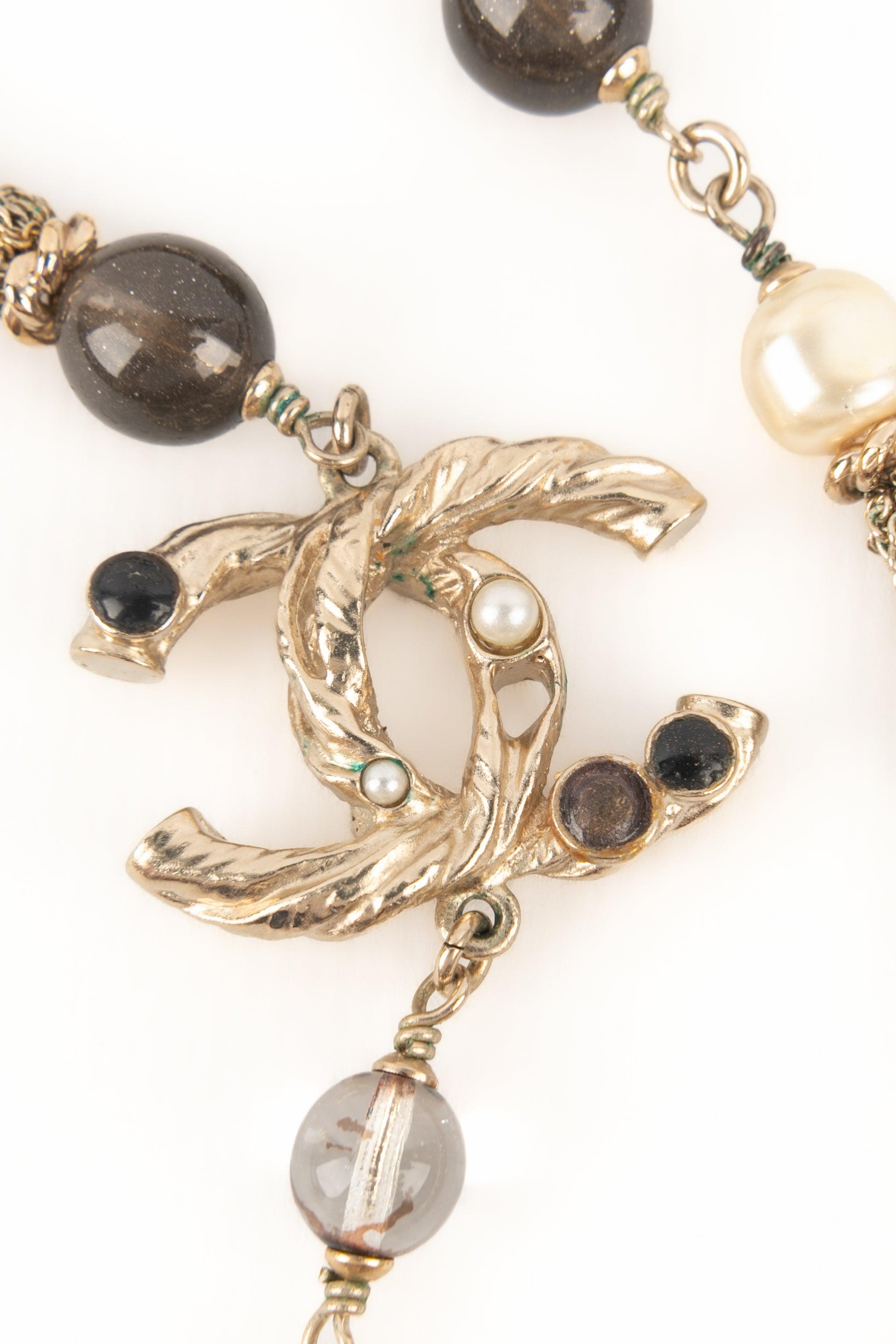 Chanel Champagne Metal Head Jewelry 2