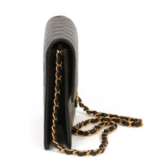 Chanel Chanel Black Quilted Lambskin Mini Classic Single Flap Bag